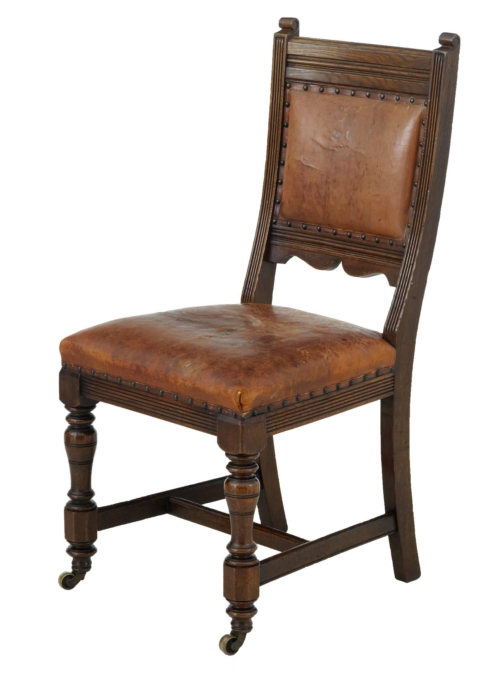 Good quality set of oak dining chairs in the manner of lambs of Manchester, circa 1890.
Turned front legs on brass castors. Fluted below the seat and on the backrest.
Good color and patina.
Original leather covering on the seats and backrest,