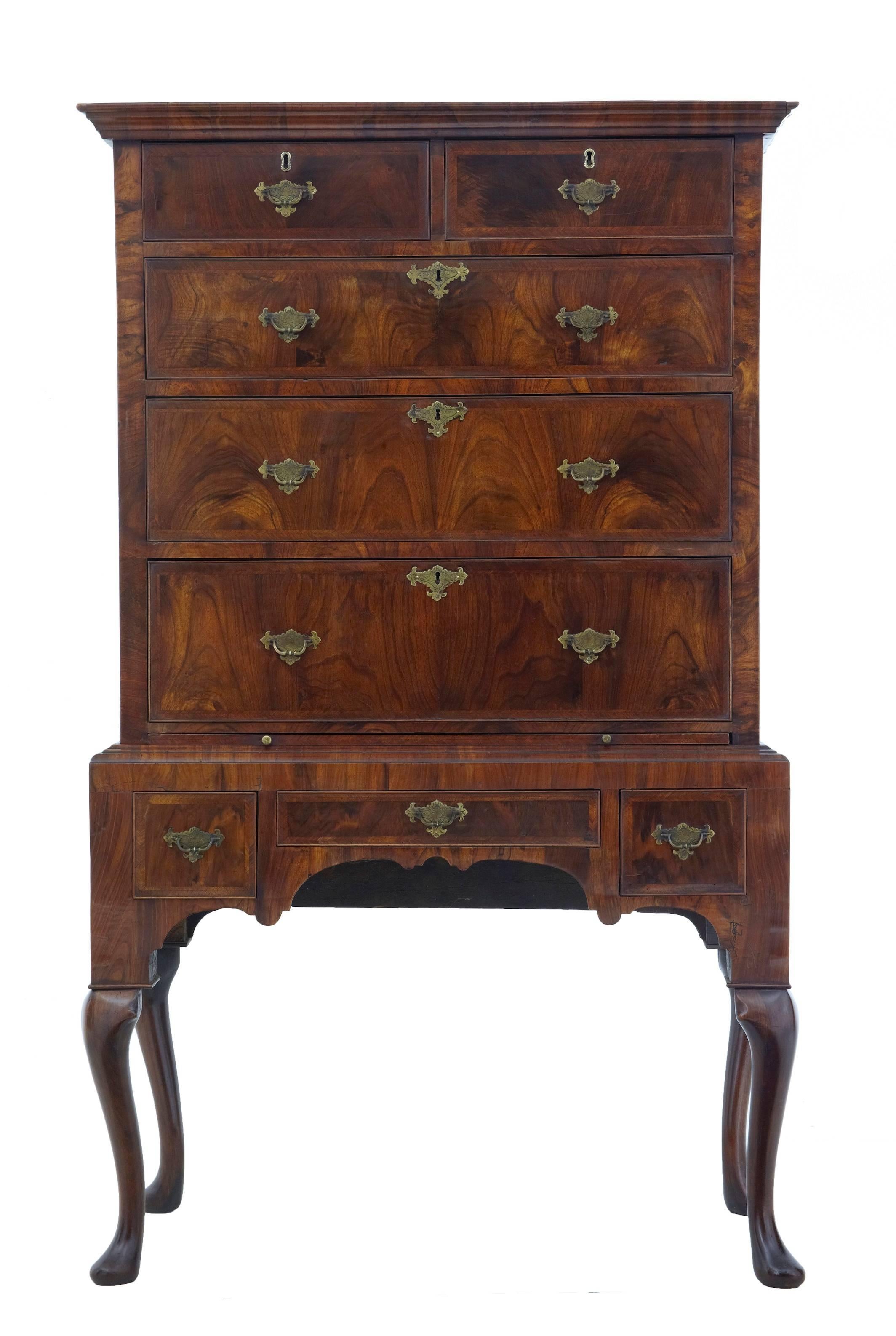 Good quality chest on stand in the Queen Anne taste, circa 1880.
Comprising of two parts.
Two over three drawers in the top section with brushing slide and three drawers in the base.
Crossbanded drawer fronts.
Standing on cabriole legs and pad