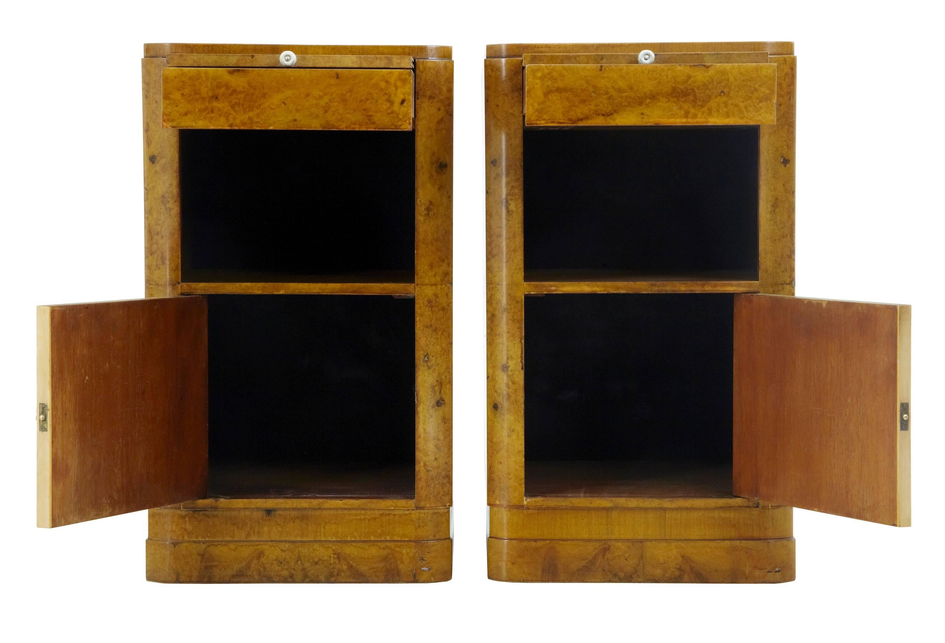 Good pair of Art Deco period walnut bedside cabinets, circa 1930.
Brushing slide just underneath the top, followed by a single drawer then an open storage space and a single door cupboard below.

Minor losses to veneer.
Measures:
Height: