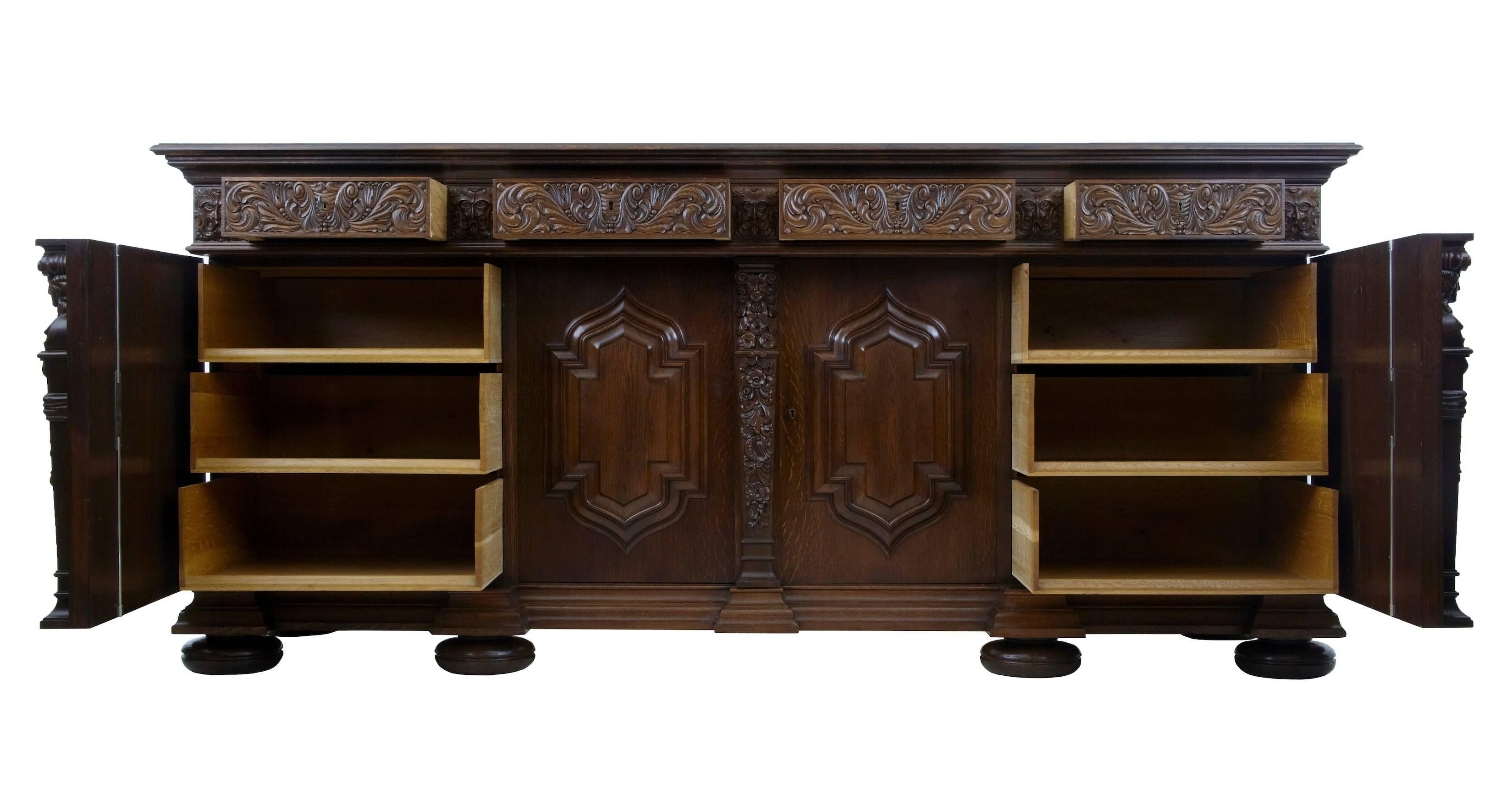 Stunning sideboard of large proportions.

Comprising of three parts, top, middle section and the base.
By Emil Jansson Halsingborg.
Four large drawers in the top, which are velvet lined with a sliding drawer inside.
The four large doors with
