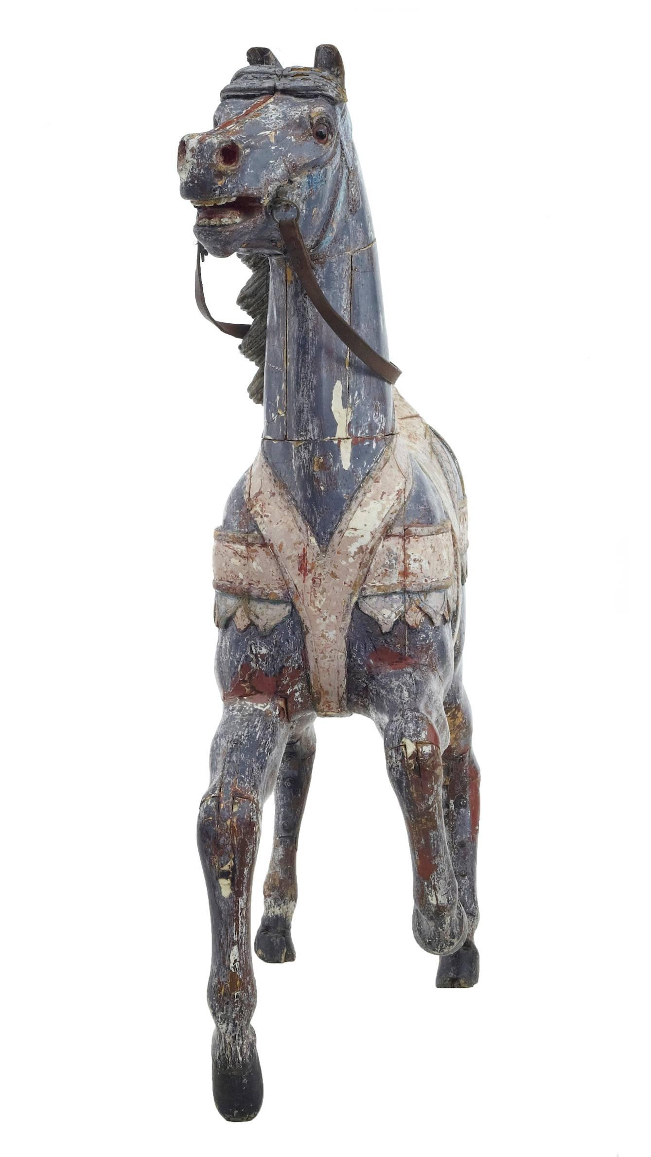 Unique continental painted merry-go-round horse, circa 1900.
Excellent opportunity to own this highly decorative item.
Now with its original coats of decorative paint dry stripped back which gives its current appearance.
With restorations to head