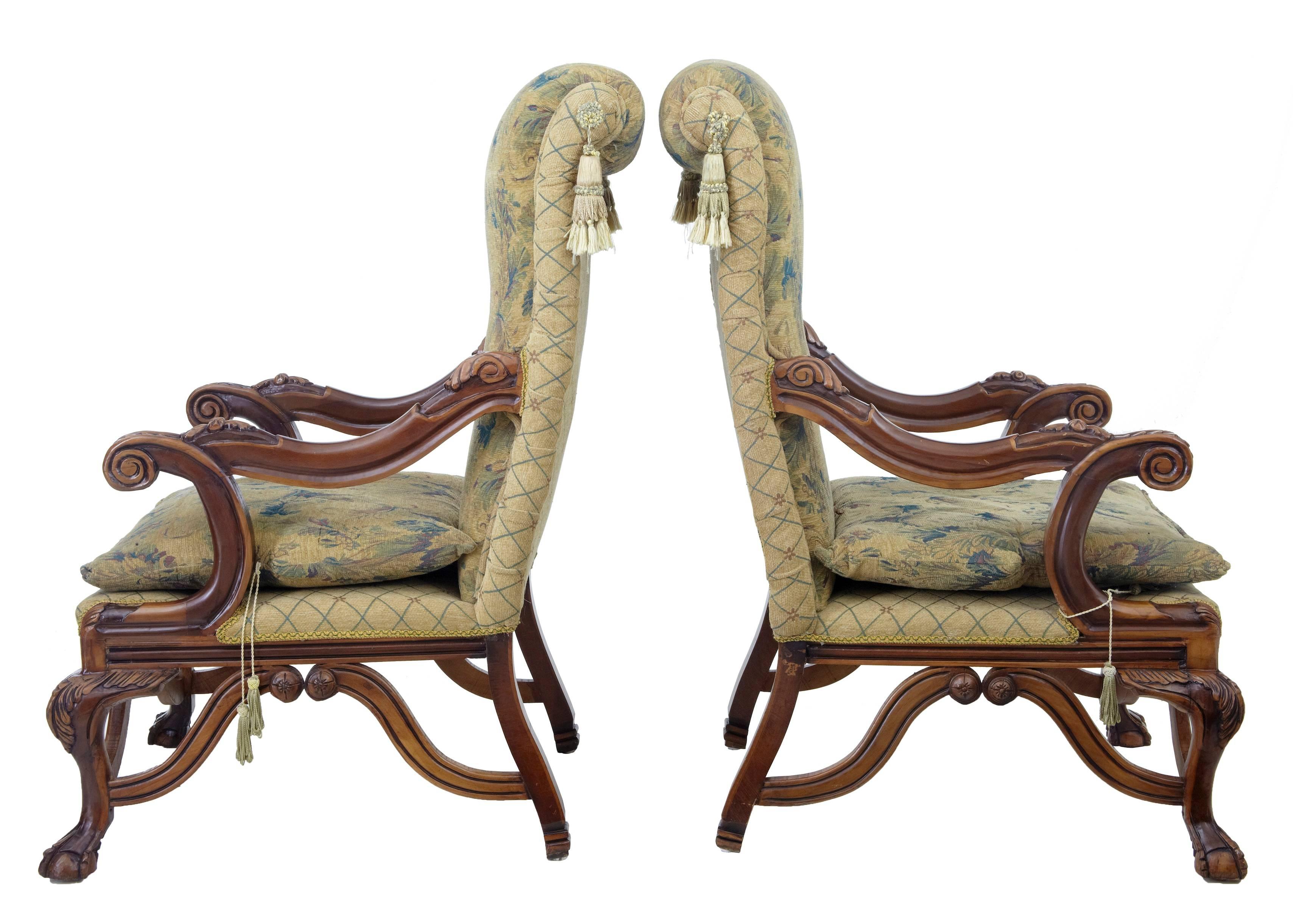 Armchairs.
Large pair of Baltic armchairs, circa 1970.
Carved and polished to highlight two tonewood.
Carved with acanthus leaf to the knee, scrolling arms.
Standing on ball and claw feet.
Measures:
Height: 49