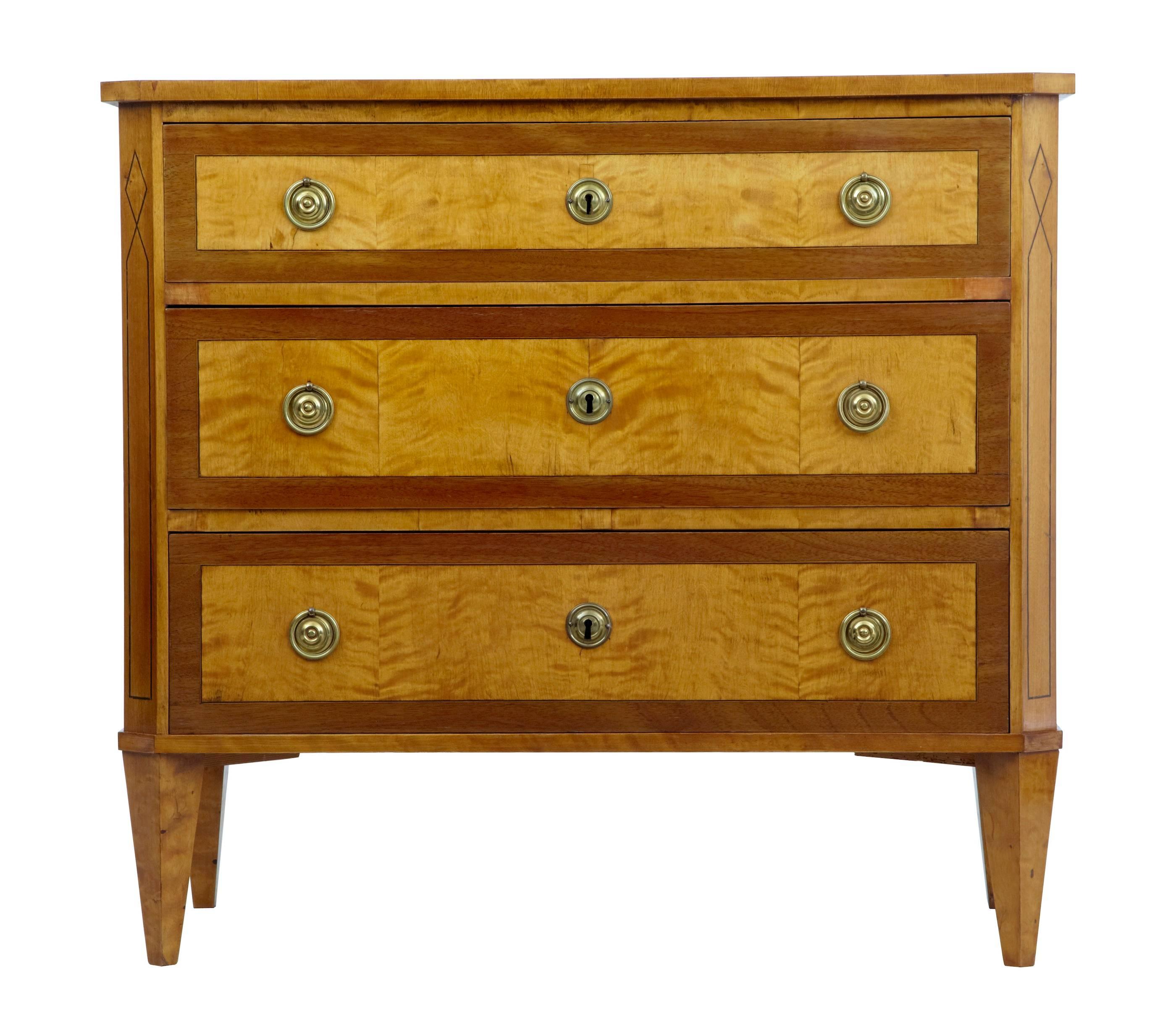 Excellent quality chest of fine proportions, circa 1890.
Three drawers cross banded with mahogany.
Good rich colour and patina with stringing to the canted corners.
Standing on tapered legs.

Height: 33