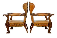 Pair of 19th century oak and embossed leather armchairs