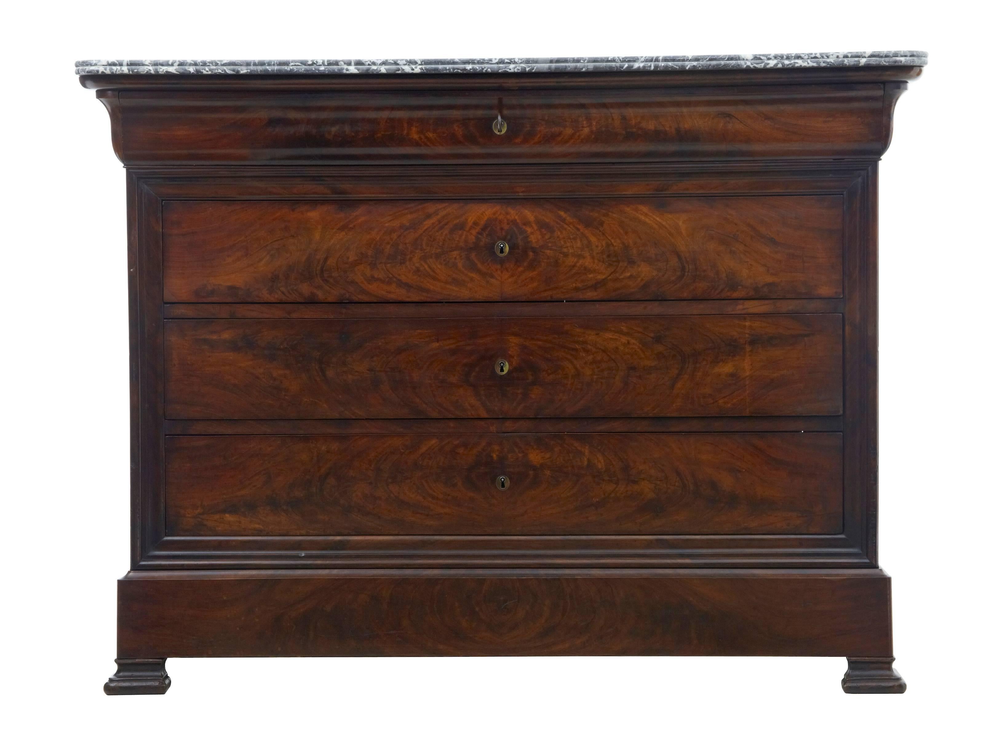 Fine French commode of good quality, circa 1860.
Excellent color and patina.
Five drawers, one of which is enclosed in the plinth.
Original marble top, which does have some minor losses to the back edge.
Drawers open on the key.

Measures: