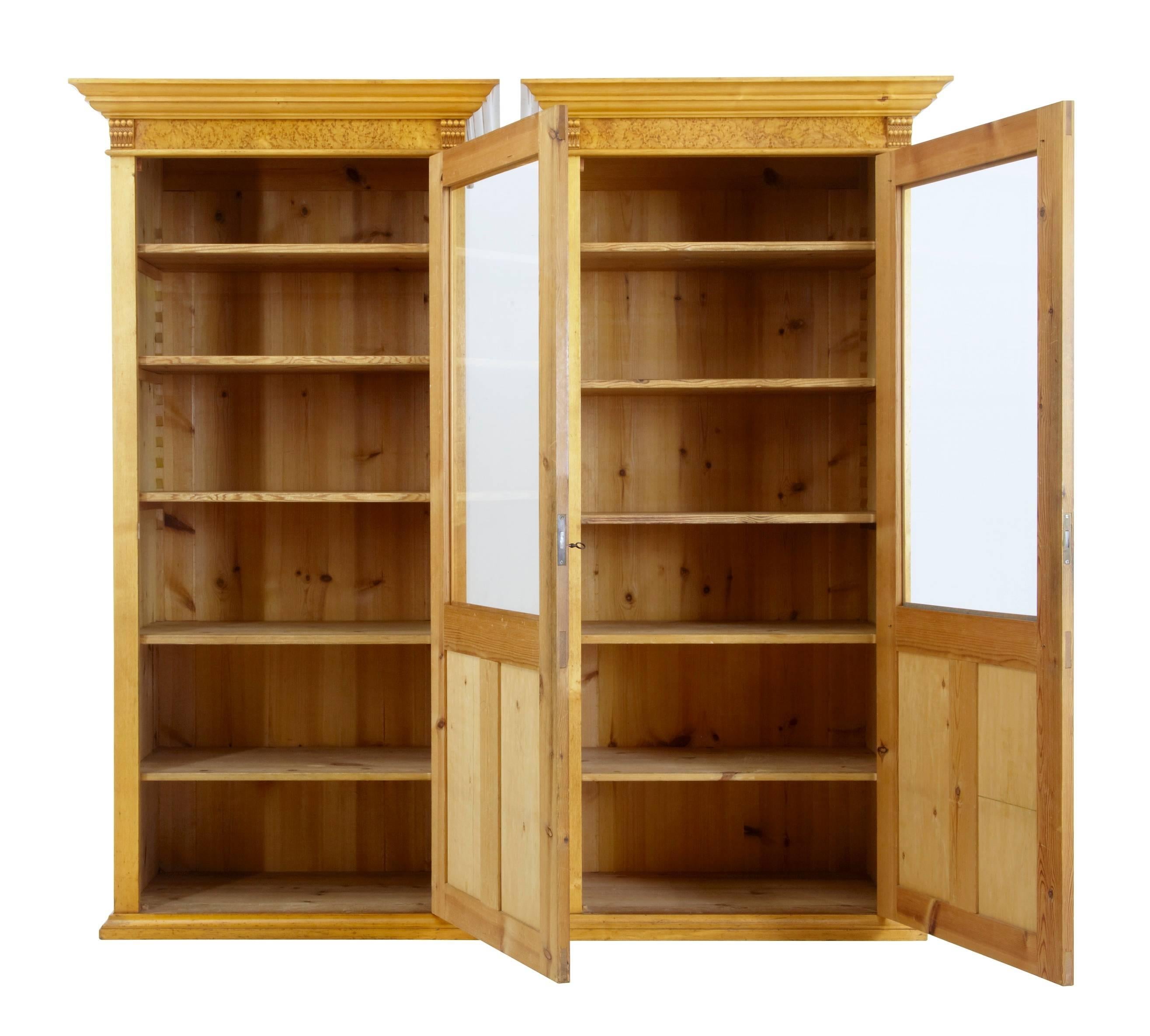 Good quality pair of birch cupboards, circa 1900.
Each with a single door which is two-thirds glazed.
Five adjustable pine shelves.
Rich burr birch veneers.
Evidence of previously having bun feet, which may be a useful
