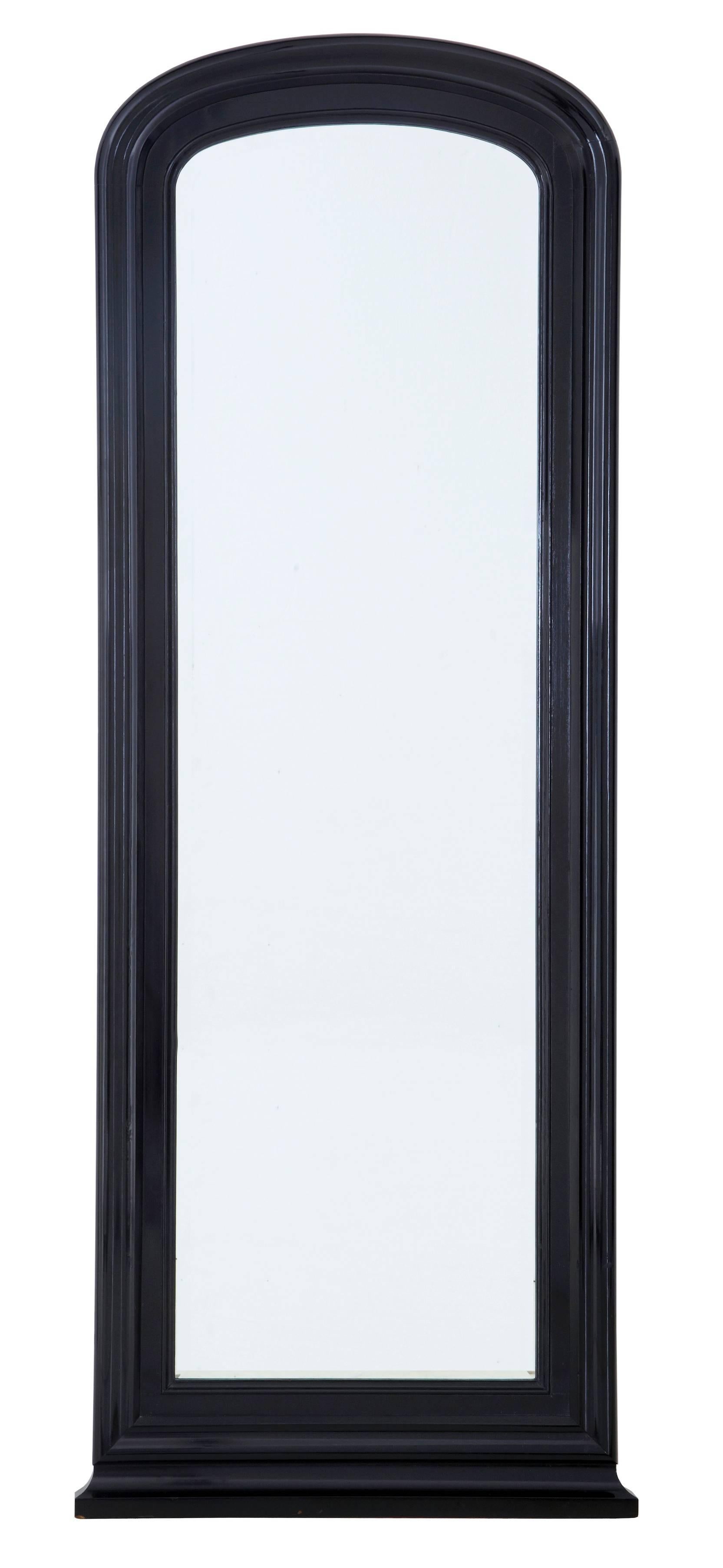 Pair of late 19th century large mirrors, circa 1890.
Later ebonized which has produced a pair of mirrors suited to most interior tastes.
Wired on the back, so can either be wall-mounted or on the floor.

Measures: Height 71