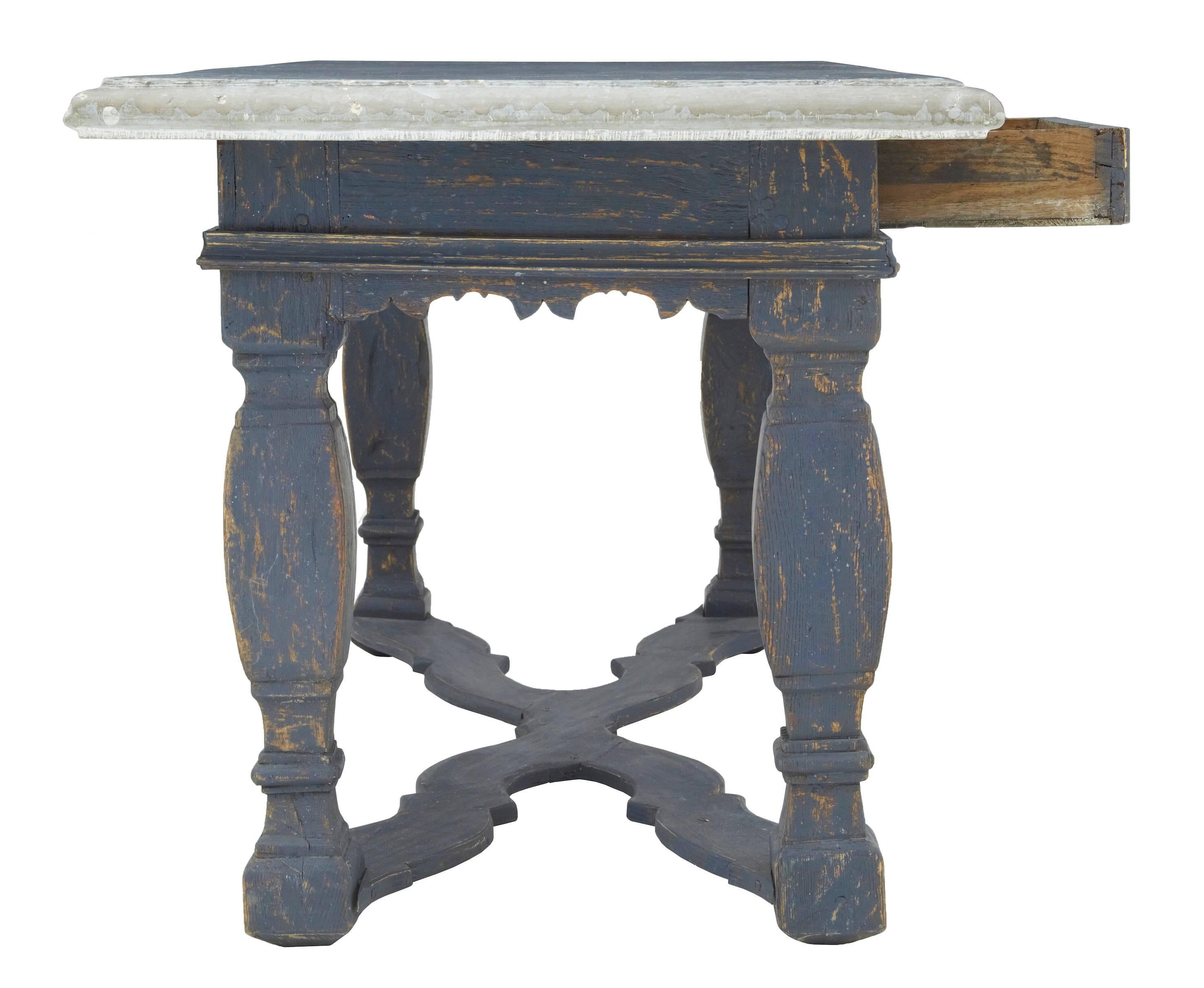 Rare Swedish painted pine table with substantial marble top, circa 1840.
Two-drawer kitchen table with very heavy original marble top.
Bulbous legs united by stretcher.
These types of table are now very rare.

Measures: Height: 32 1/4
