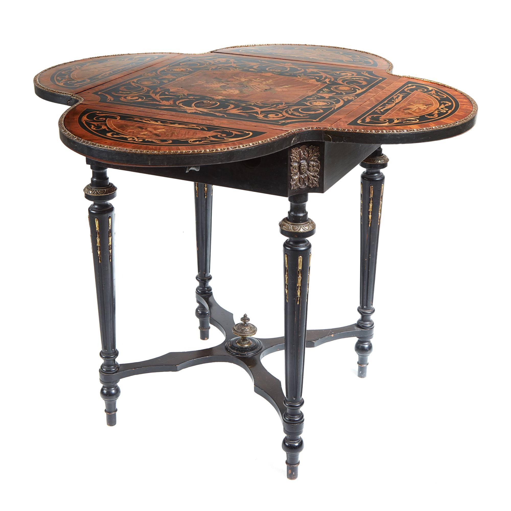 Fine French marquetry drop leaf occasional table, the top with fine marquetry satinwood, walnut, boxwood, kingwood and black lacquer inlay framed within a kingwood crossbanding and boxwood stringing, the four shaped drop leafs with good quality