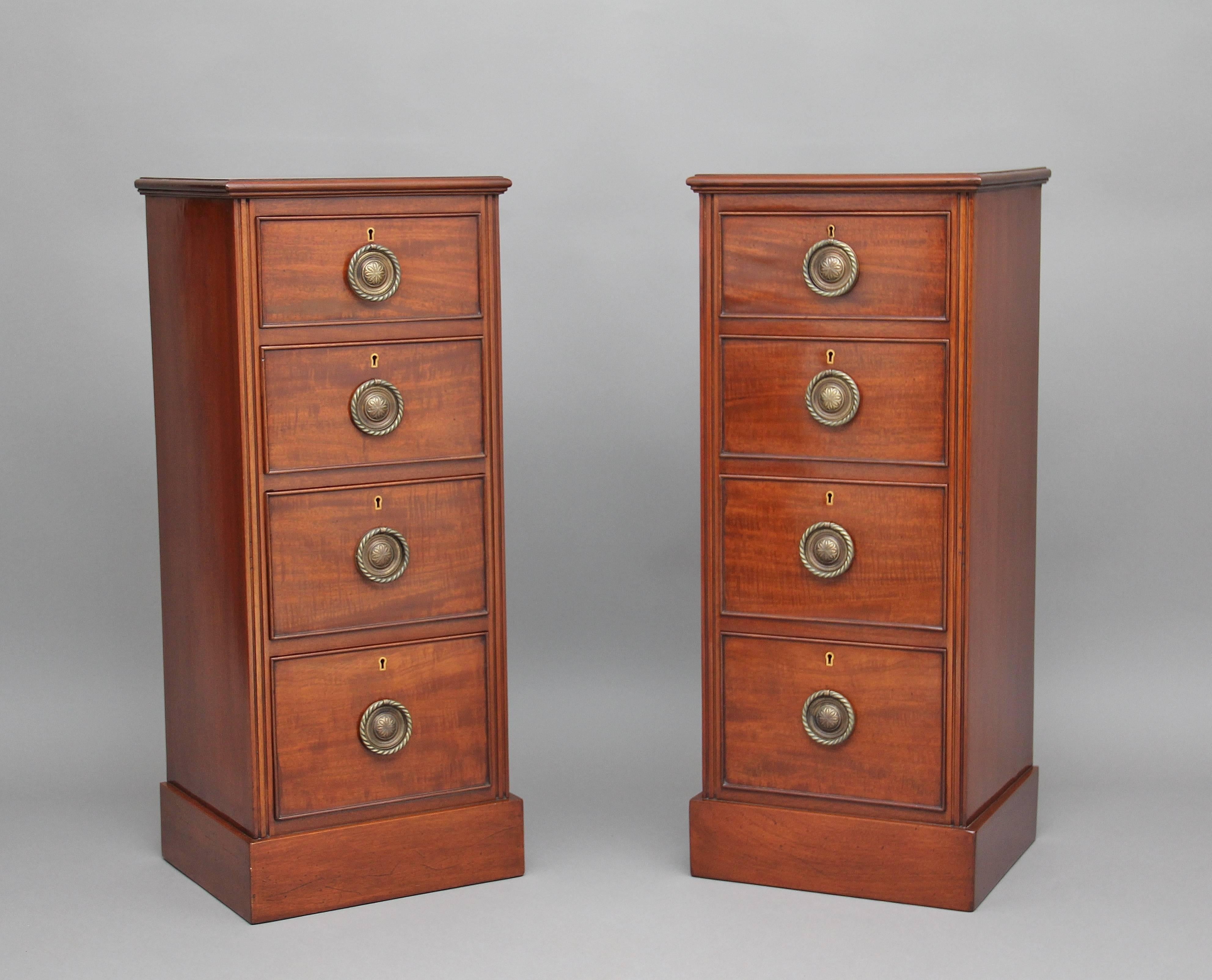 A nice pair of early 20th century mahogany bedside chest’s, with a moulded edge top, with reeded decoration running down on either side of the chest fronts, each chest having four oak lined graduated drawers with brass ring handles, standing on a