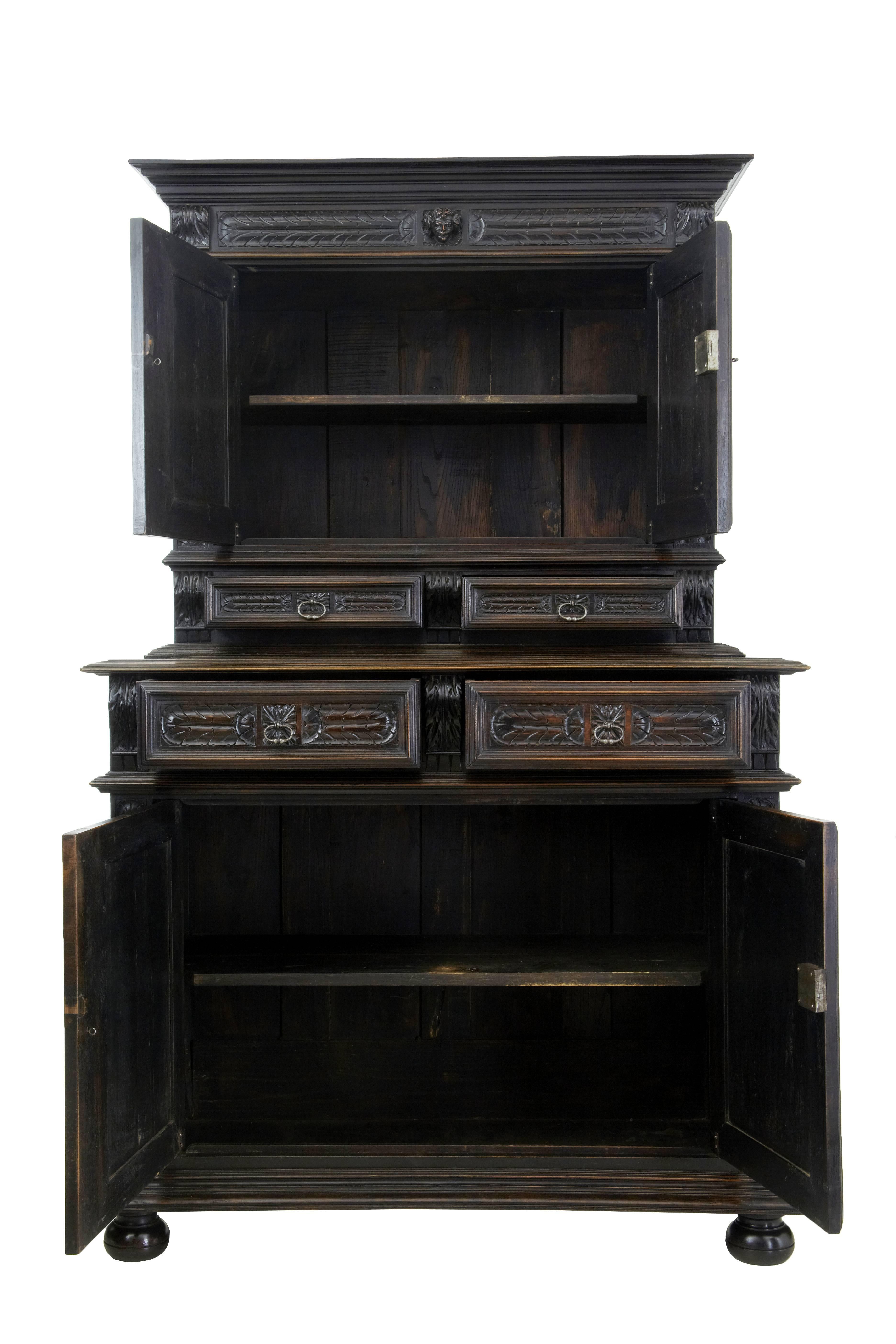 Good quality carved Italian two part cabinet cupboard, circa 1880.
Beautifully carved in a dark walnut.
Features four carved panels on the doors of Spanish gentlemen in 16th century dress.
Comprising of two parts, the top section with a double