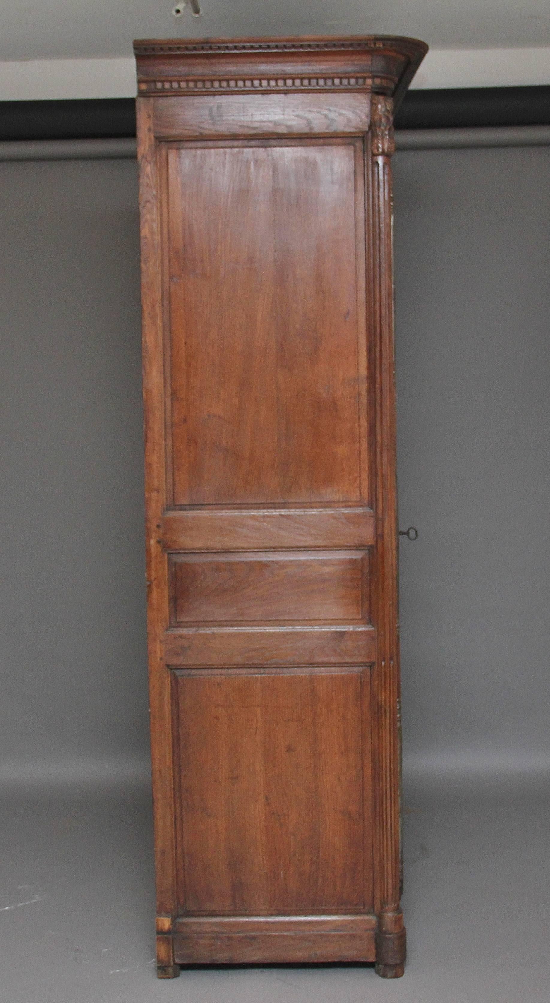 French Provincial Early 19th Century French Carved Oak Marriage Armoire