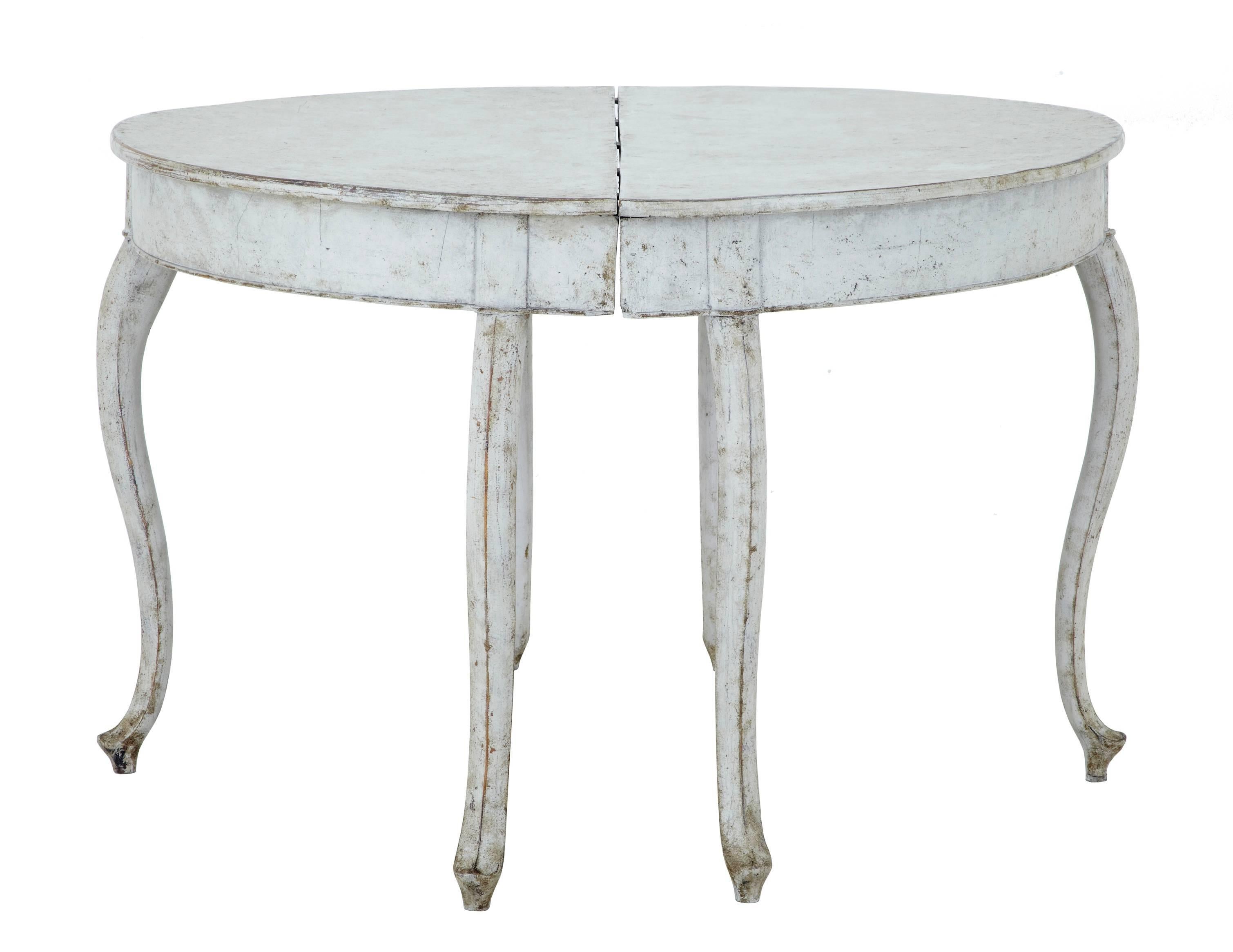Pair of Swedish painted demilune tables, circa 1880.
Formerly from a dining table, these pair of d end tables now serve well as side tables and still have the capacity to form a round table.
Made from pine, the later paint has now taken on a used
