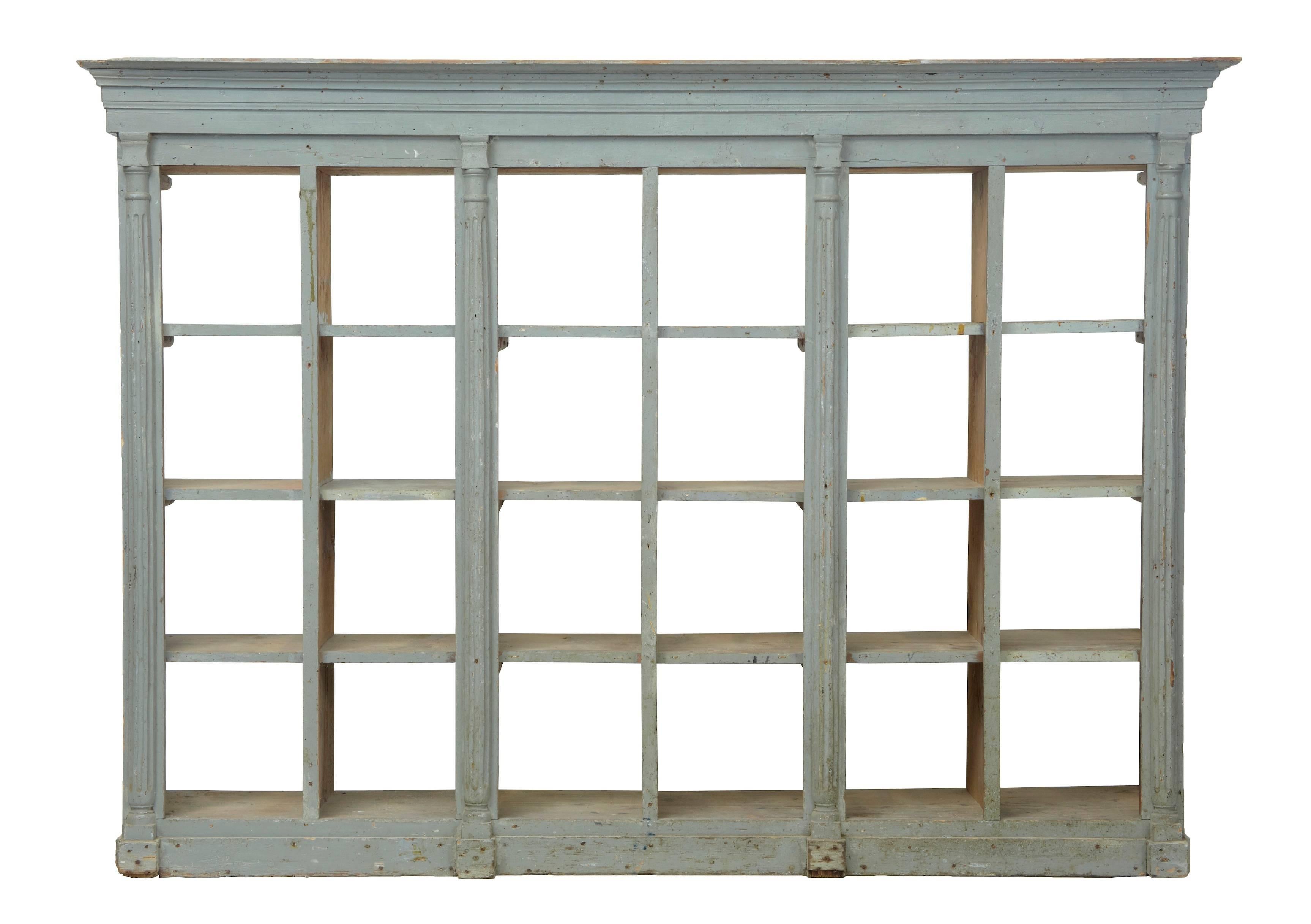 Unusual Swedish painted pine shelving unit, circa 1880.
Lends itself perfectly to a shop display or a interesting installation for the home.
Features shaped cornice and columns in between each section.
24 equal size compartments.
Later