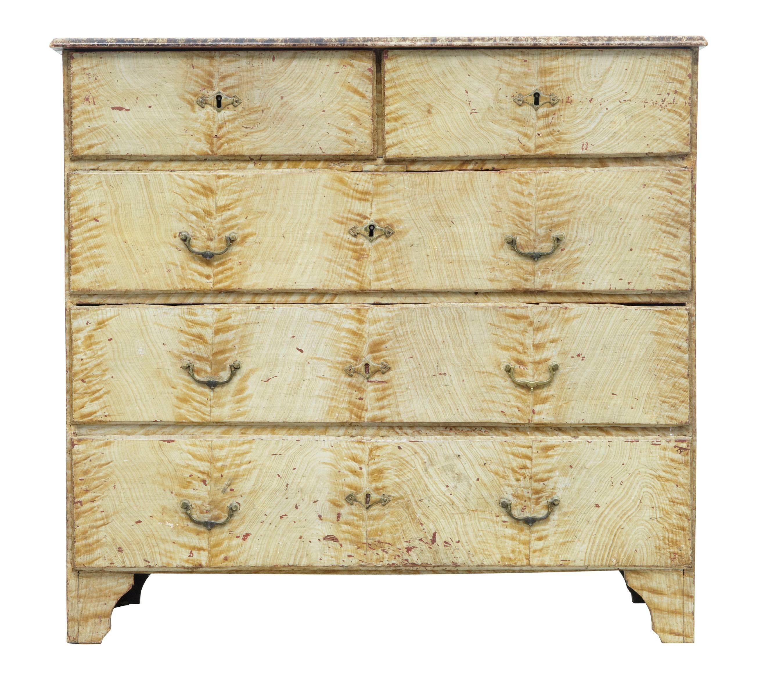 Good quality simulated grain painted Swedish chest, circa 1870.
Two short over three long drawers.
Two-tone painted border on the top.
Top two drawers open on the key, bottom three have handles.
Some losses to paint effect and drawer fronts,