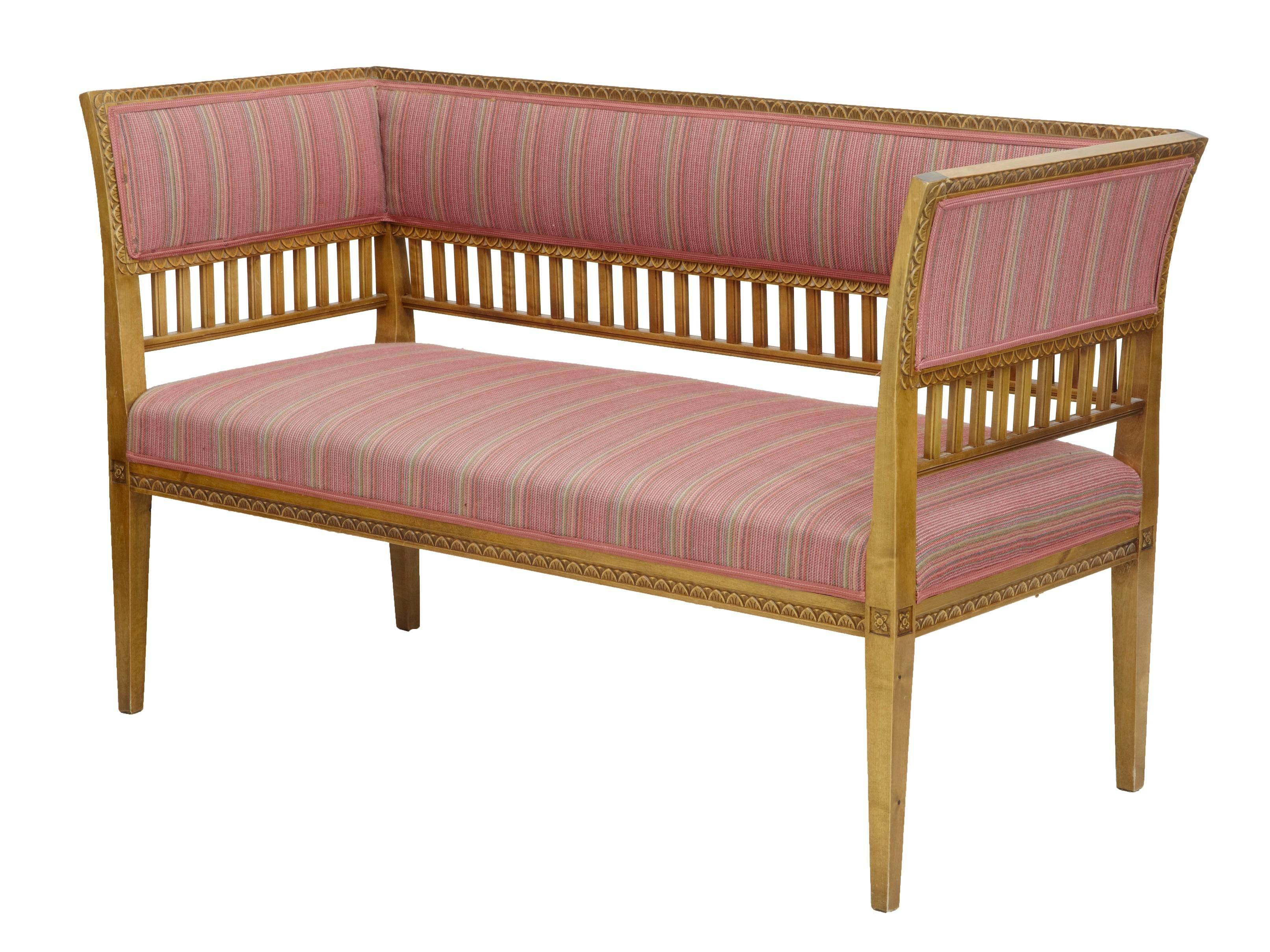 Good quality pair of birch sofas, circa 1910.
Gustavian inspired with light carving around the backrest. Exposed woodwork.
Standing on tapering legs.

Upholstery in good useable condition.
Measures: Height: 33