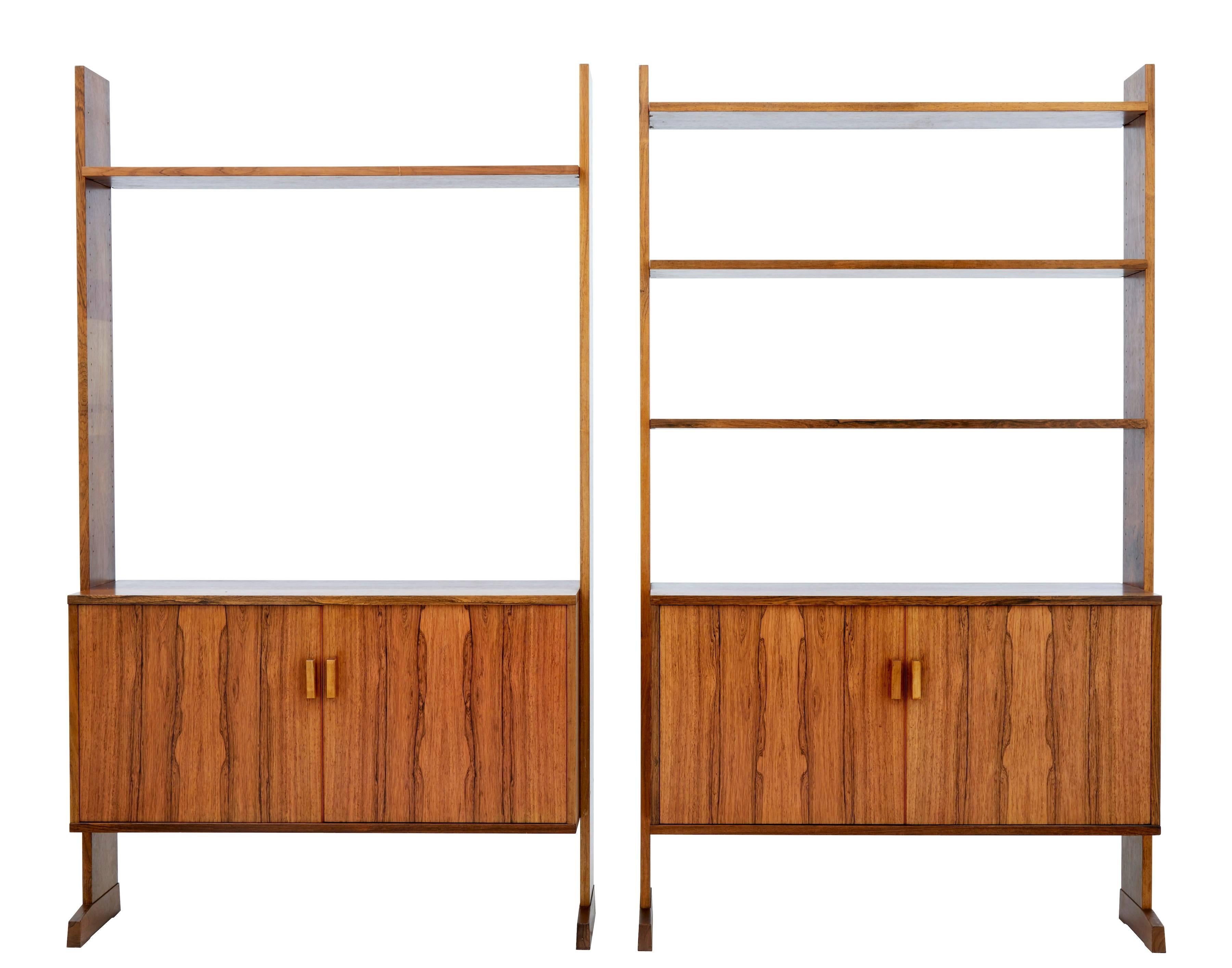 Fine quality piece of late 1960s Danish modular furniture.
At full length this piece operates as a central writing small desk area flanked either by bookcase cabinets.
As this is a modular piece there are several scenarios in how this piece can be