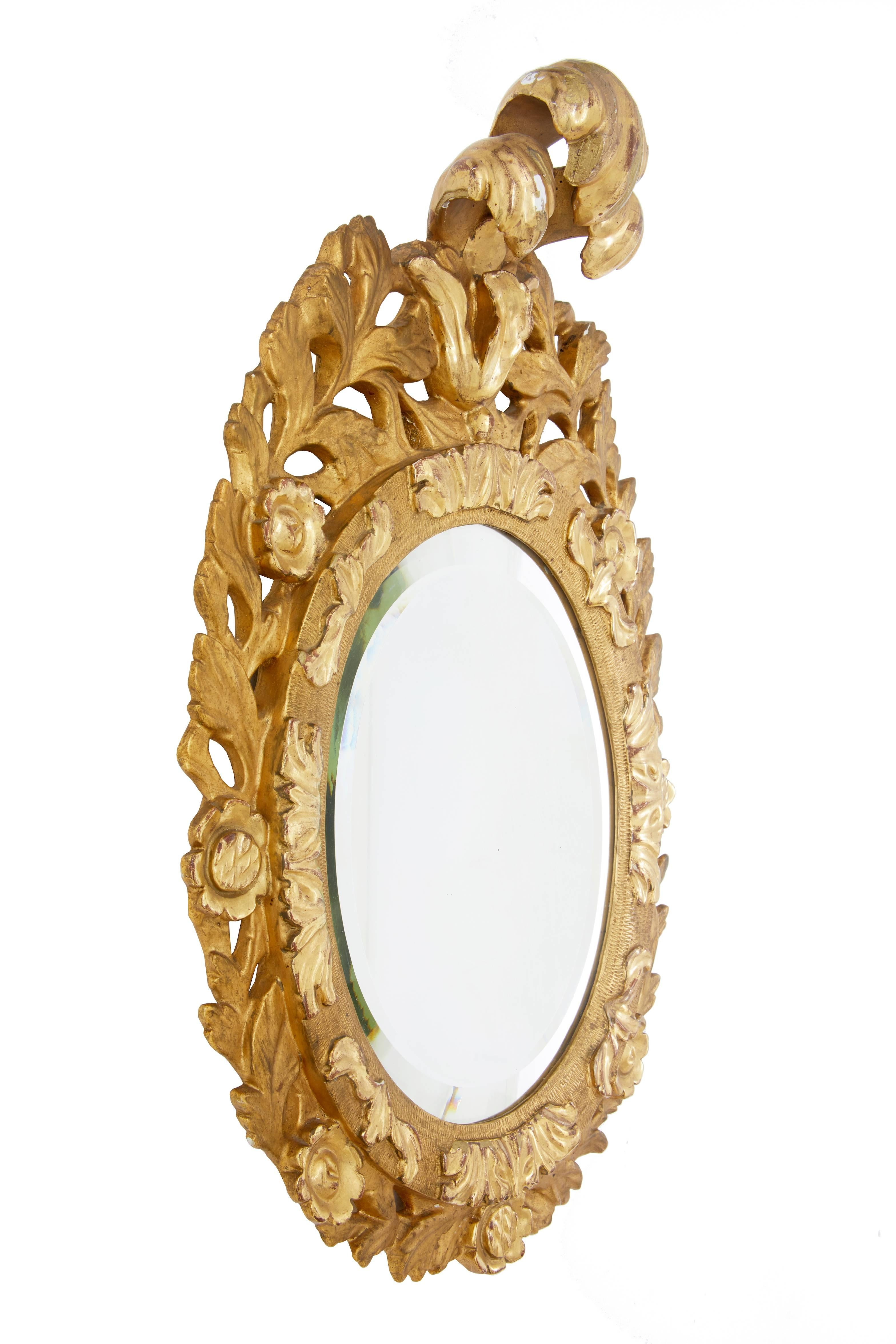 Good quality carved gilt mirror, circa 1890.
Leaf pattern around the outer edge, surmounted by large over hanging leaves.
Minor gilt losses and rubbing.
Measures: Height 23 1/4