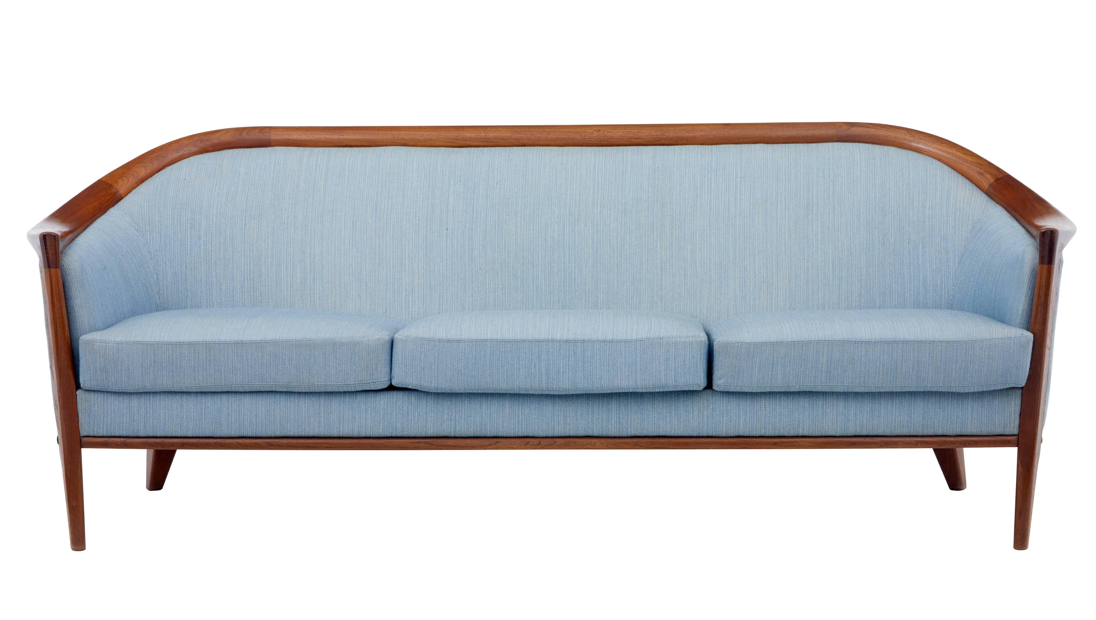 Classic piece of 1970s Scandinavian design
Horseshoe shape with teak frames of good color.
Upholstery with some staining which should clean out, which we could undertake if not being re-covered.
Sofa measurements:
Height: 28 1/2