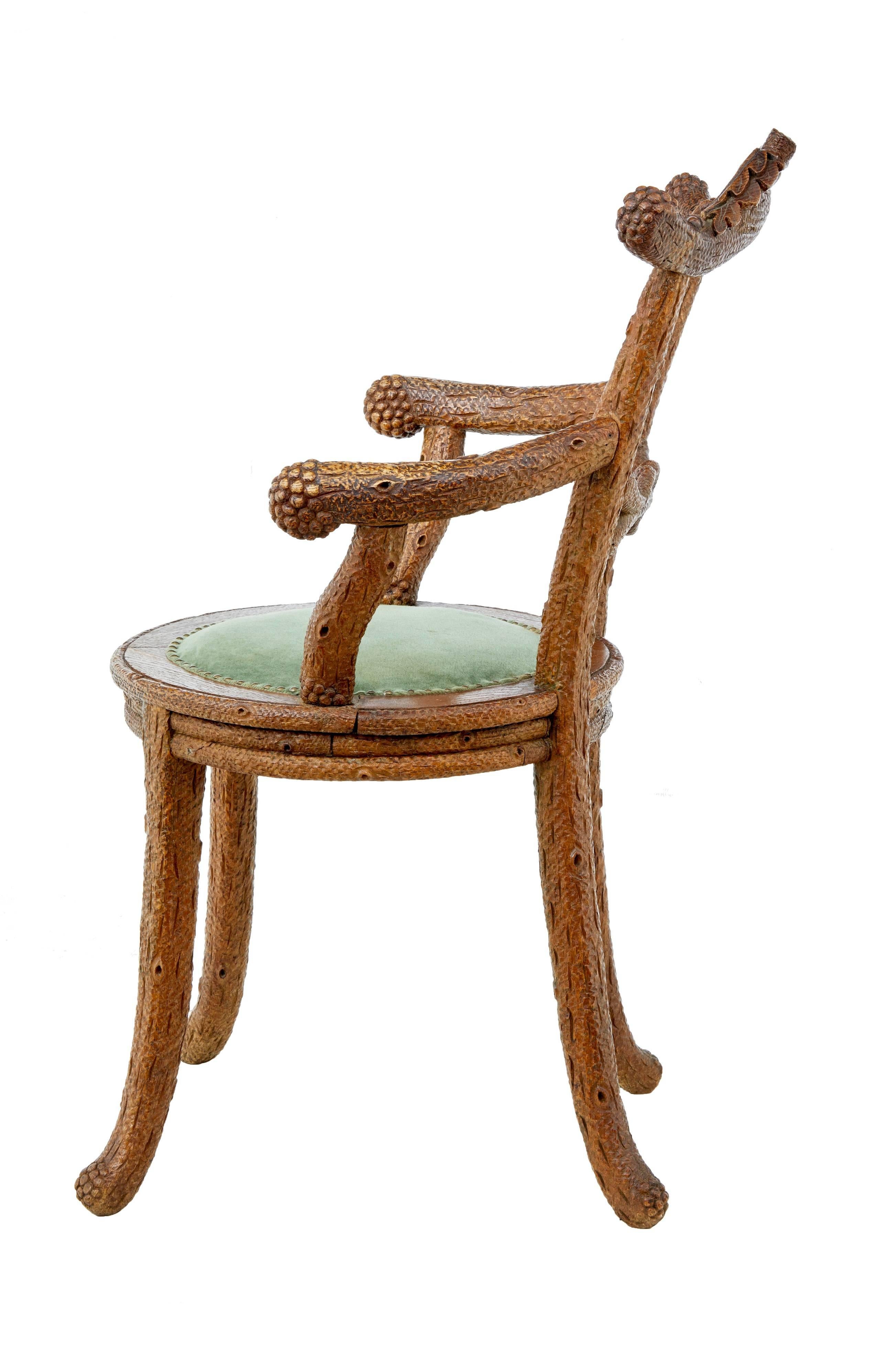 Good quality Black Forest carved oak armchair, circa 1880.
Profusely carved in oak to simulate tree bark, decorated with carved acorns.
Small padded seat.

Areas of restoration to woodwork.
Measures: Height 35 1/2