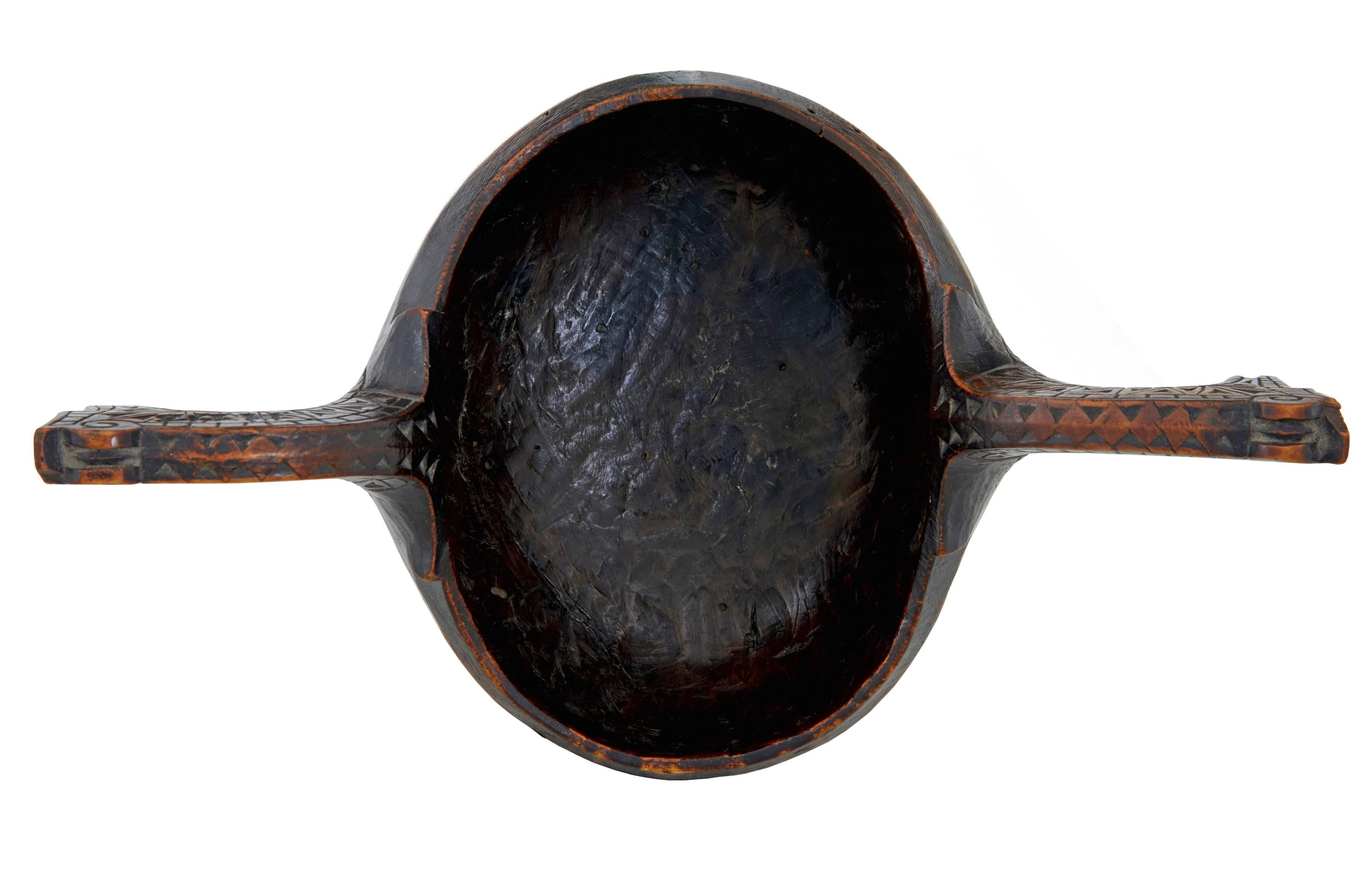 Good quality Norwegian horse head ale bowl known as a kasa/kuksa.
Dated on the base 1773, with makers marks.
Hand-carved decoration.
Traces of old inactive worm.

Measures: Height 4 1/2