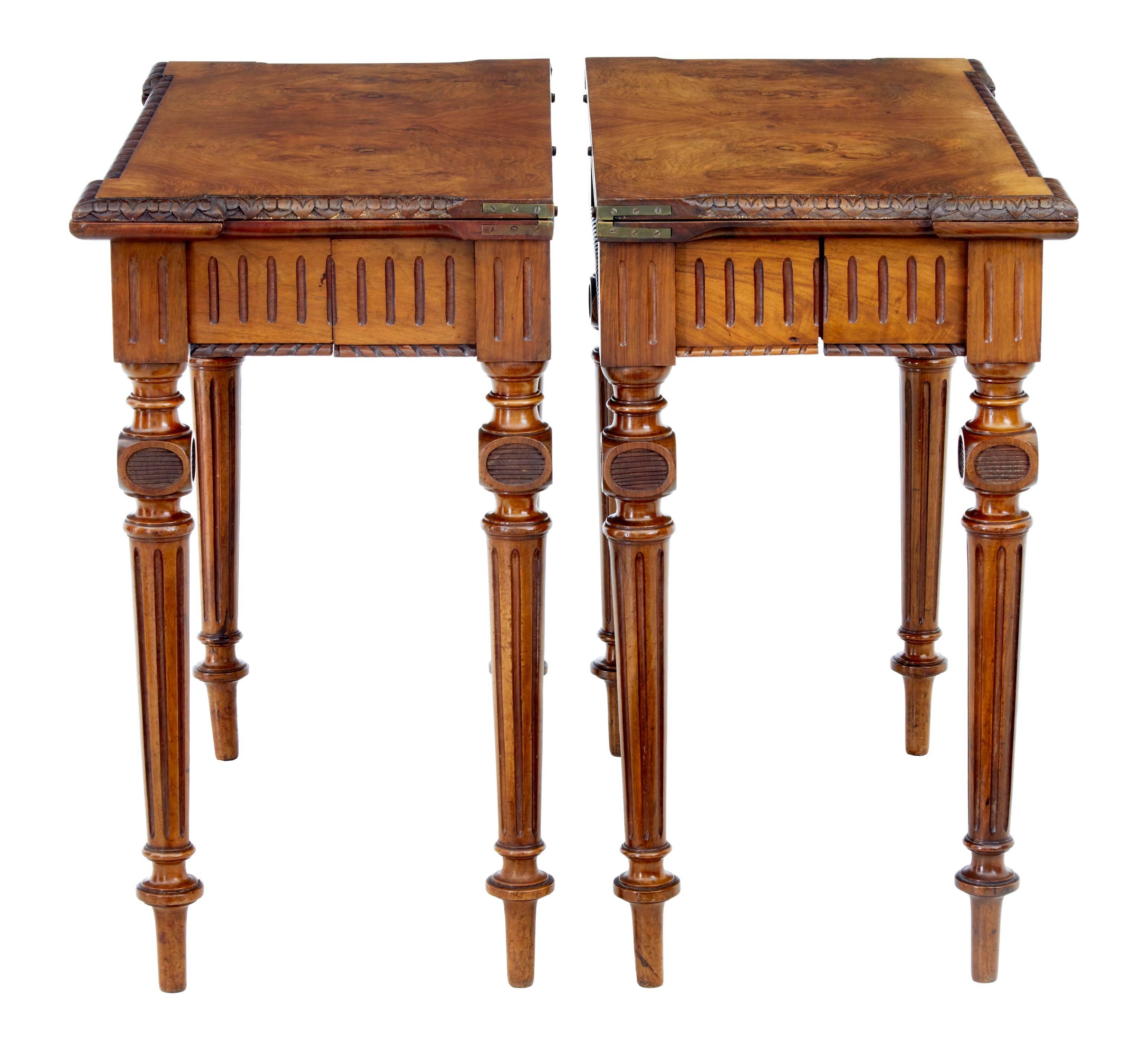 Pair of 19th century burr walnut tea tables, circa 1880.
Elegantly made with burr walnut veneers and striking matching veneers on the inside.
Carved canted edging.
Standing on turned and fluted legs.

Measures: Height 29 1/2