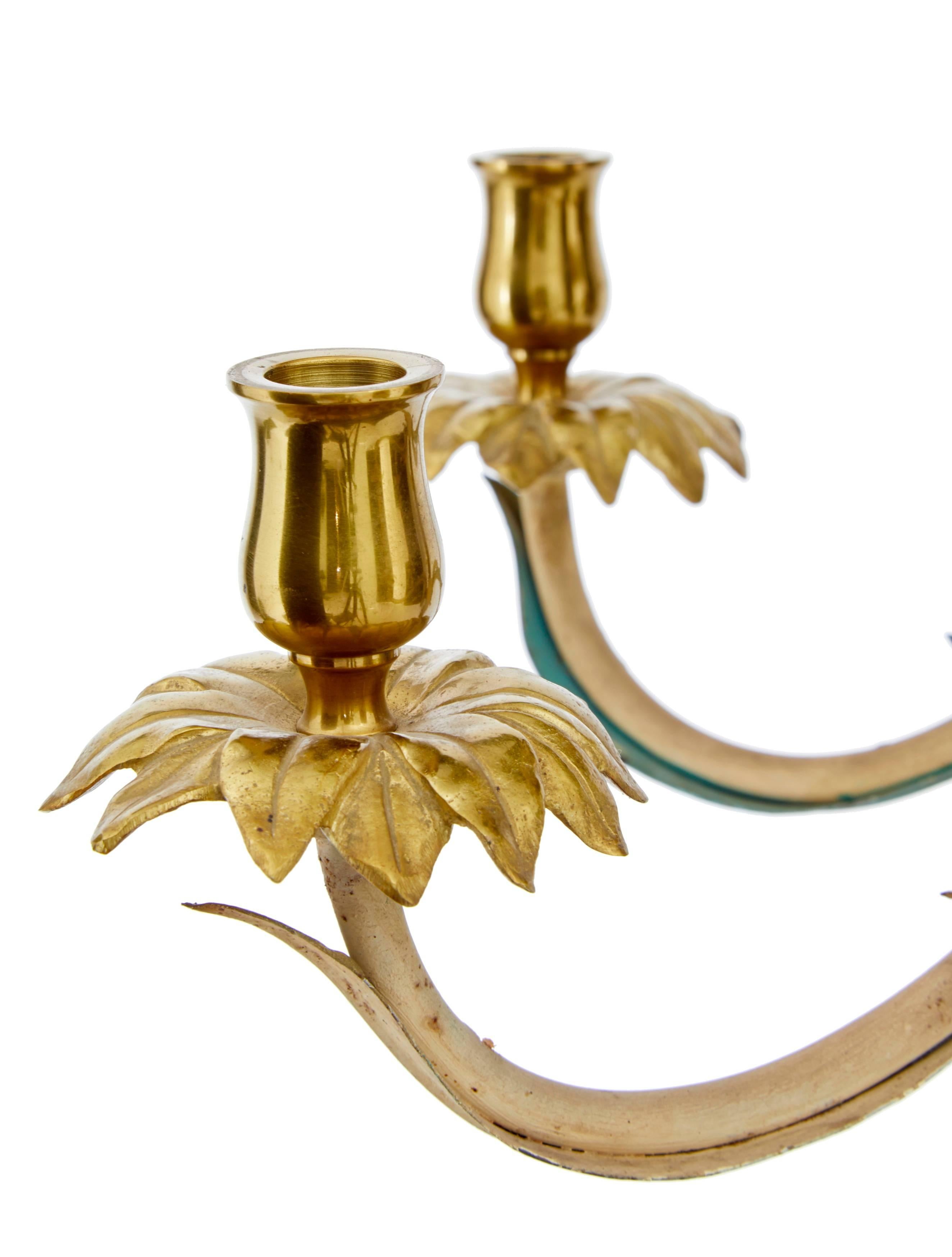 Six-arm chandelier by reknowned French maker Bagues.
Good quality polished brass, decorated with painted leaves to form a palm.
Spun brass ceiling rose with chain support which hooks on to the light.
No electrics.

Measures: Height 37