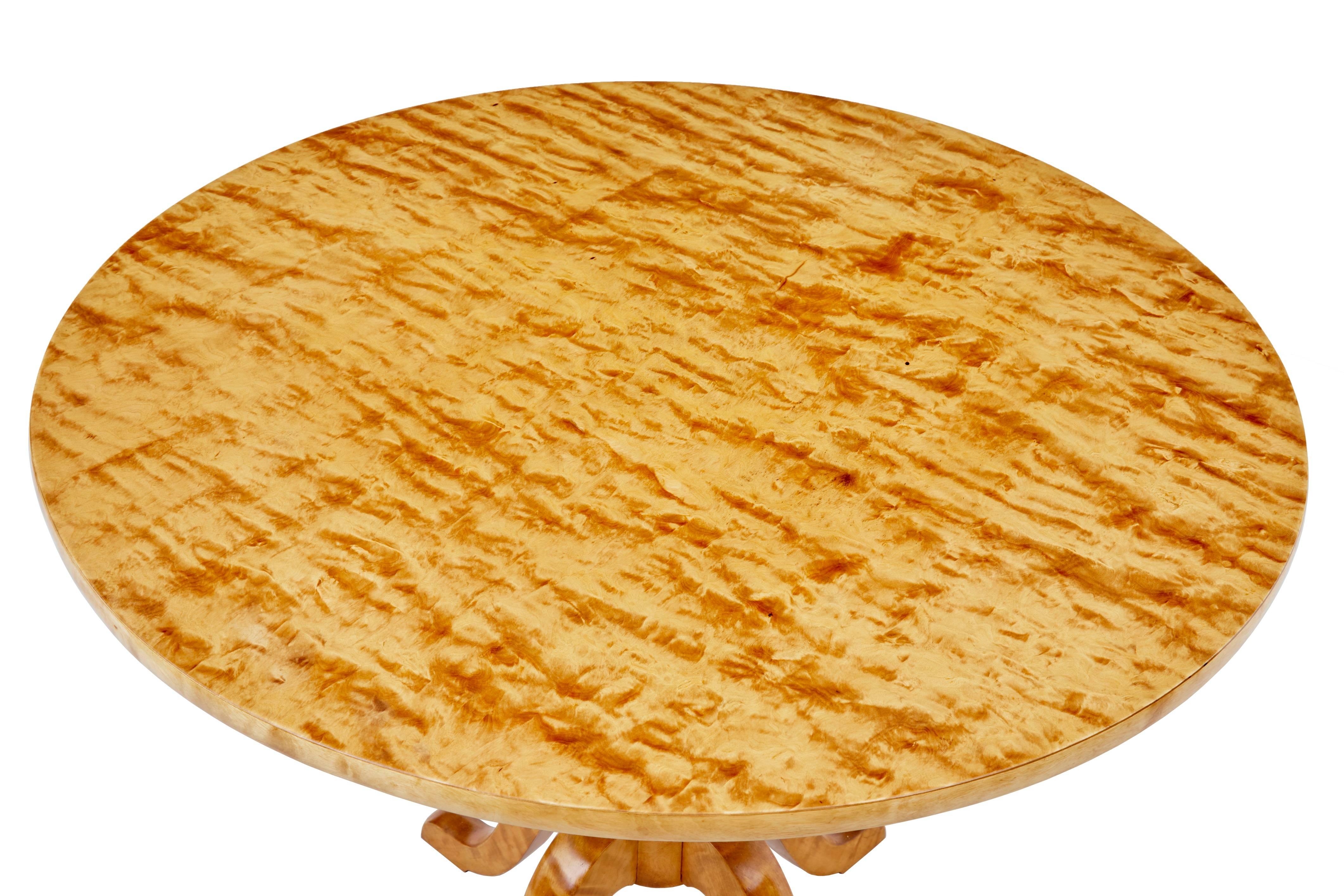 Art Deco birch occasional table, circa 1920.
Circular top unusually standing on a four legged base.
Golden birch veneers.
Ideal for a side table or lamp or sofa table.

Measures: Height 26 1/3