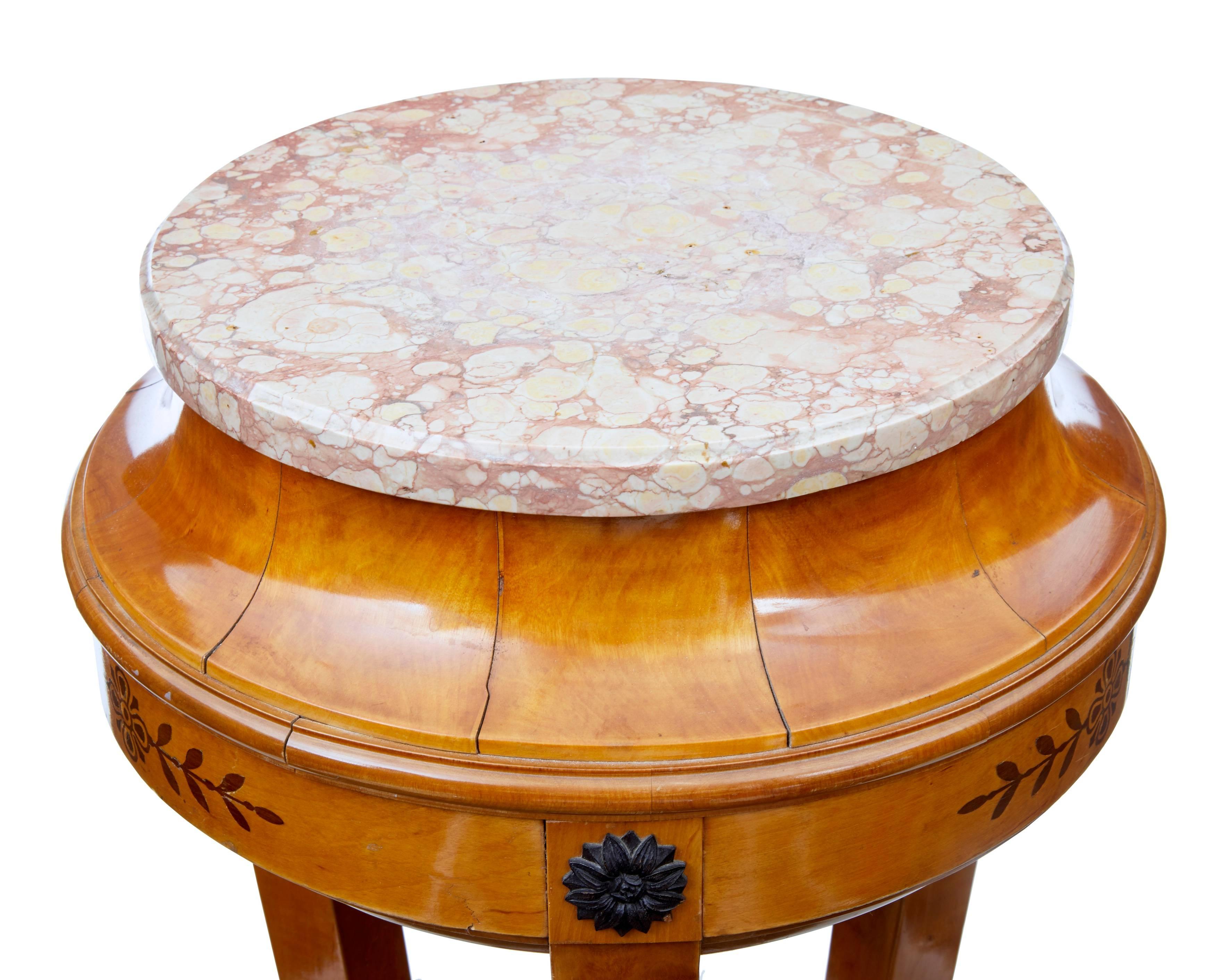 Top quality birch jardinere stand, circa 1890.
Circular marble top which is removable. (Please advise if you want this fixed permanently)
Inlaid with mahogany. Standing on three swooping legs which terminate into a tripod base.
Some movement to