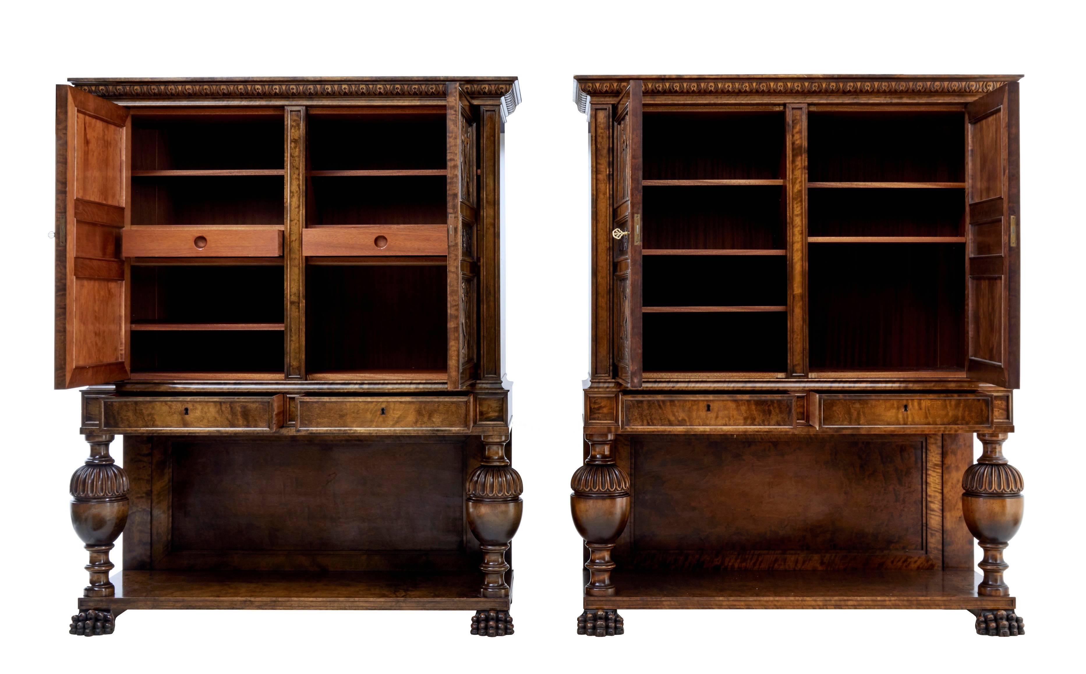 Here we offer a fine pair of Swedish cabinets from the late 1940s.
Imposing and masculine cabinets beautifully carved in birch.
Scenes on the doors show men hunting, fighting and courting.
Comprising of two sections.
Double doors open to a