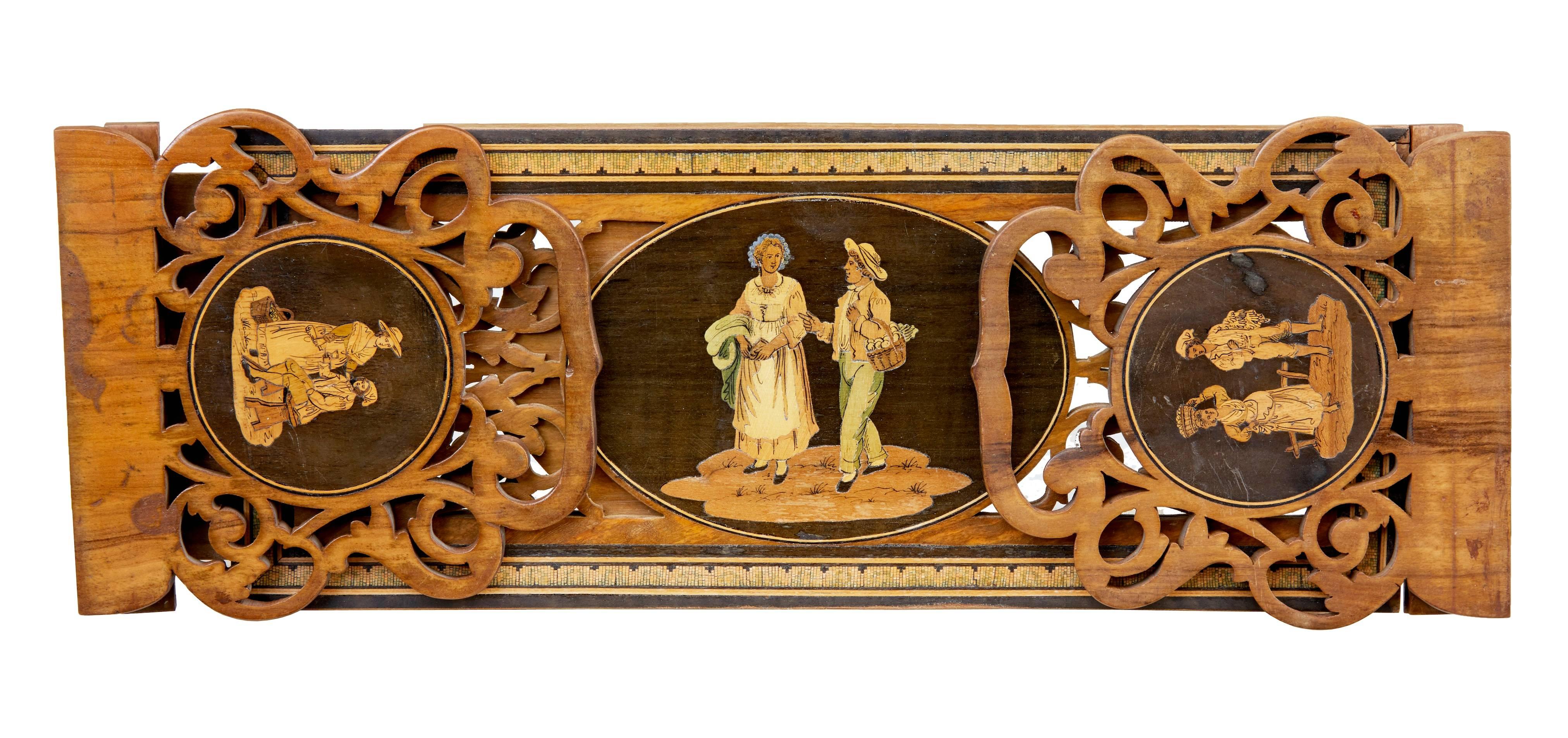 Good quality piece of Sorrento ware.
Pierced fretwork book ends. Three inlaid panels of a rural subject.
Extends an extra 10 inches.
Minor veneer restorations and repairs to underneath.

Height: 6