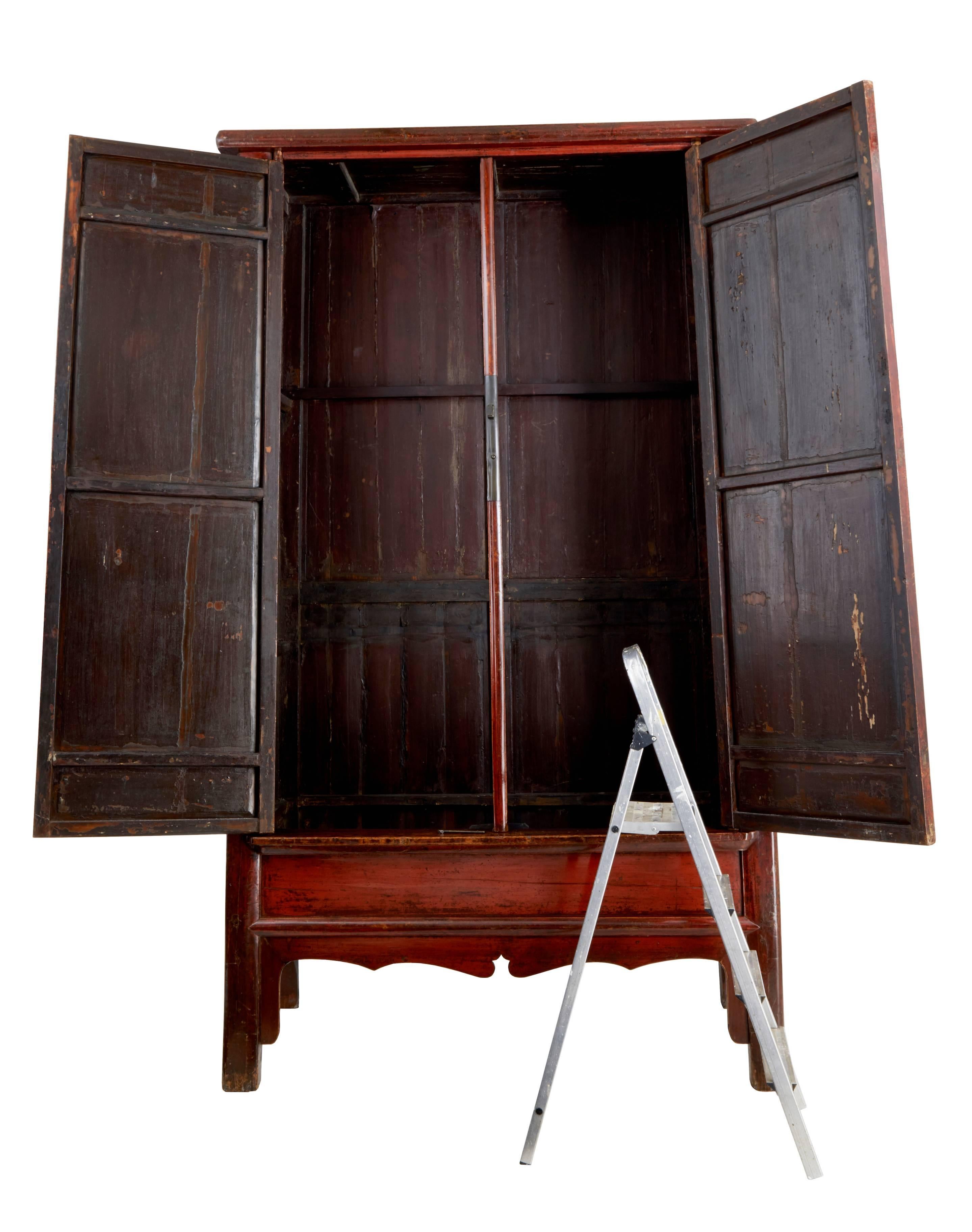 Stunning Chinese cupboard of the largest proportions we have ever seen, circa 1880.
Stunning distressed red lacquer finish.
Massive decorative piece with plenty of possibly uses.
Interior is a blank canvas, which would have had a pair of full