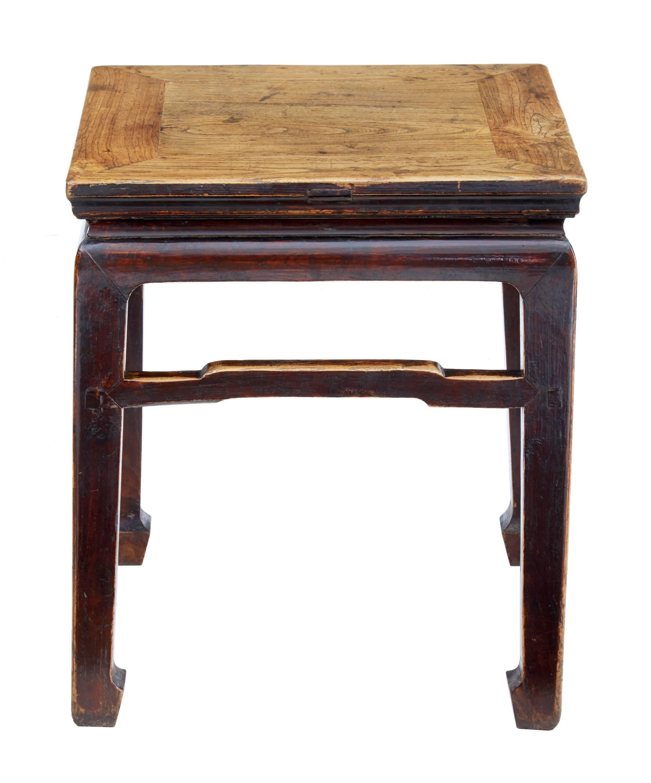 Chinese elm stool, circa 1880.
Dark red lacquered legs and frame with lacquered elm top.
Ideal for use as a lamp / occasional table.
Small areas of fill to top surface.

Measures: Height 20 1/2