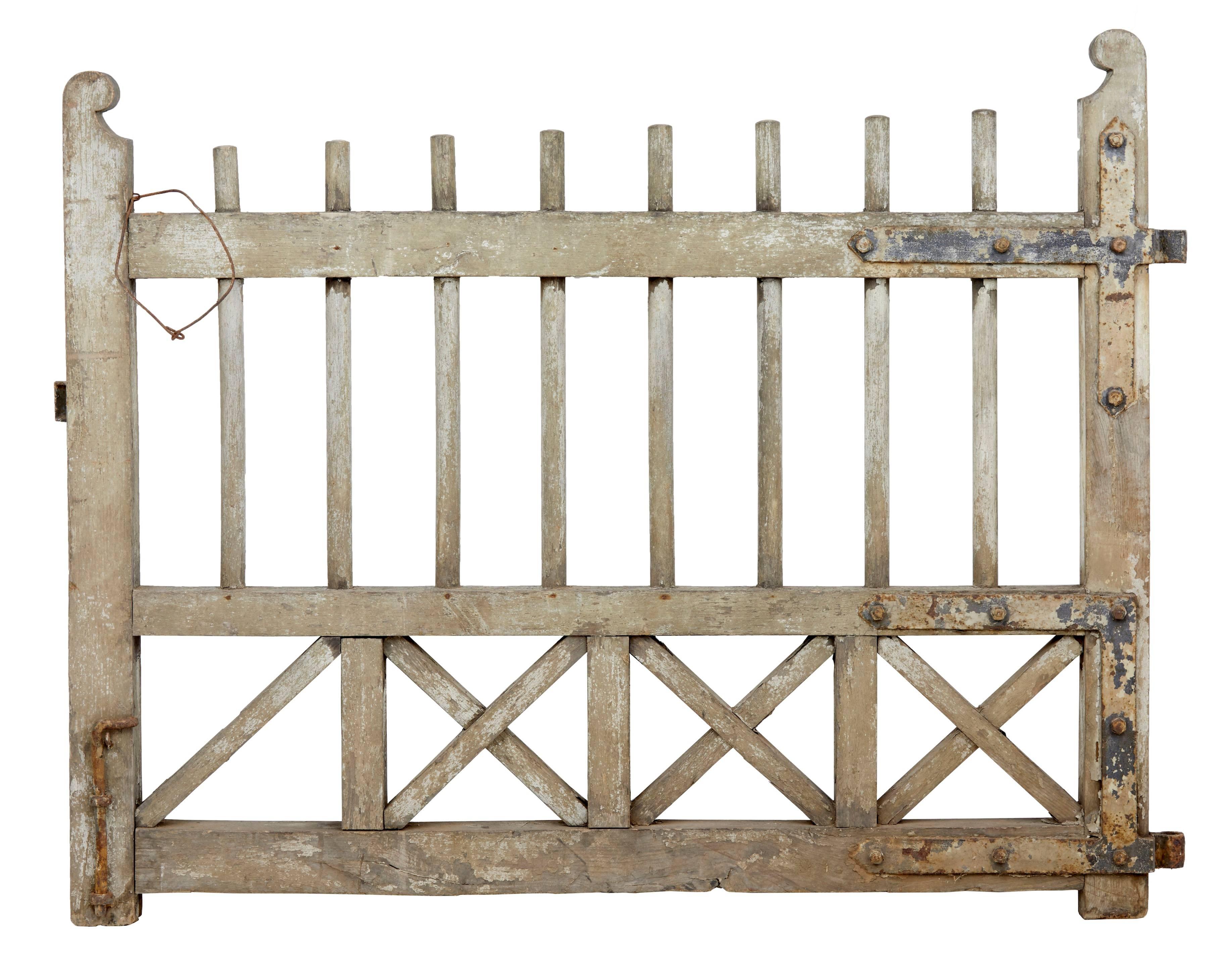 Fine pair of rustic Swedish gates, circa 1890.
In original as sourced condition.
Evidence of original paint and complete with original iron work.
We have presented these with the losses that we found them with but all the parts missing are