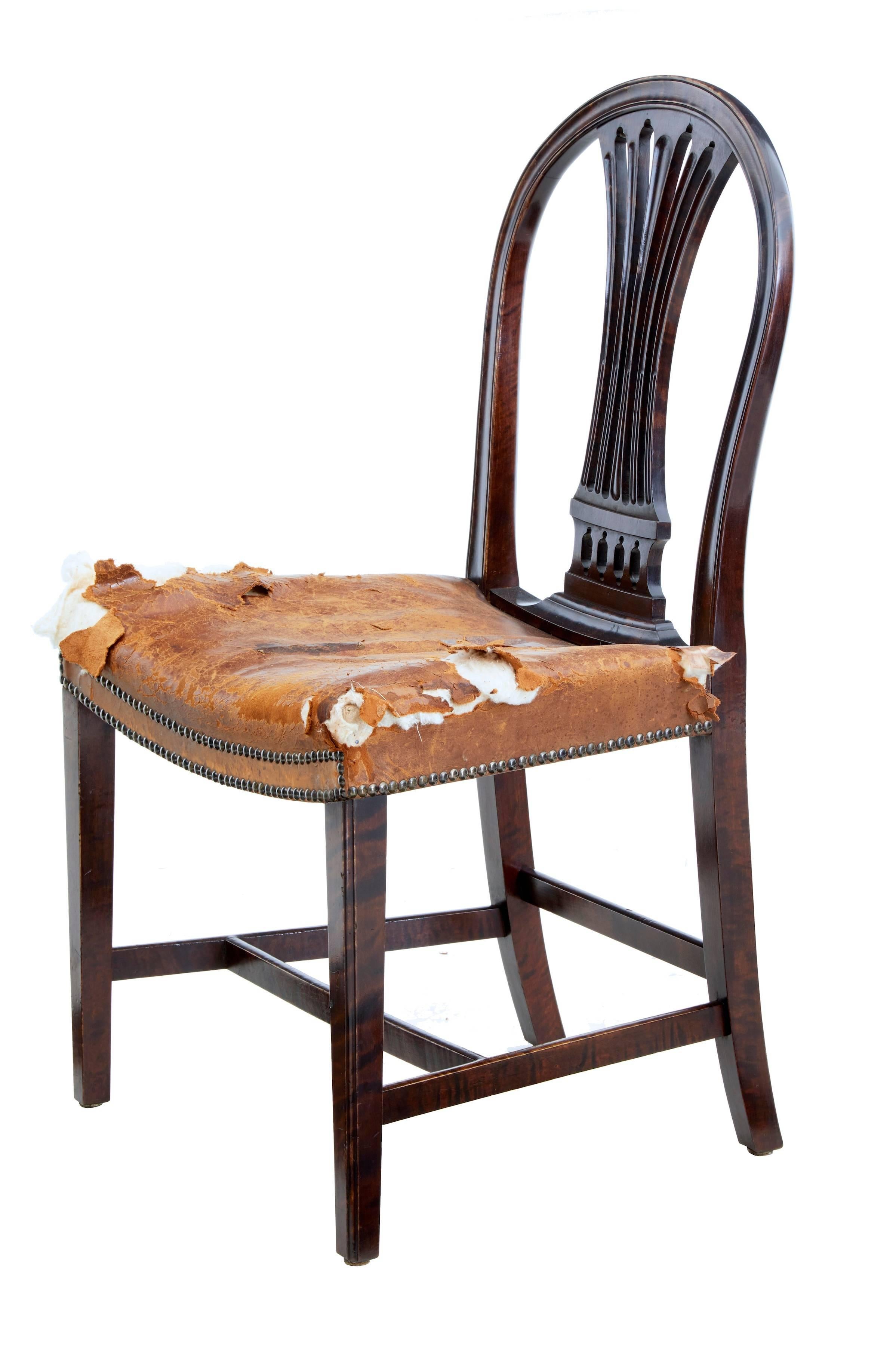 Elegant set of Swedish dining chairs, circa 1880.
Dark stained birch which still allows the grain to show through.
Shaped back with pierced backrest.
Tapered legs united by stretchers.
Leather covering in obvious need of replacement, but left on