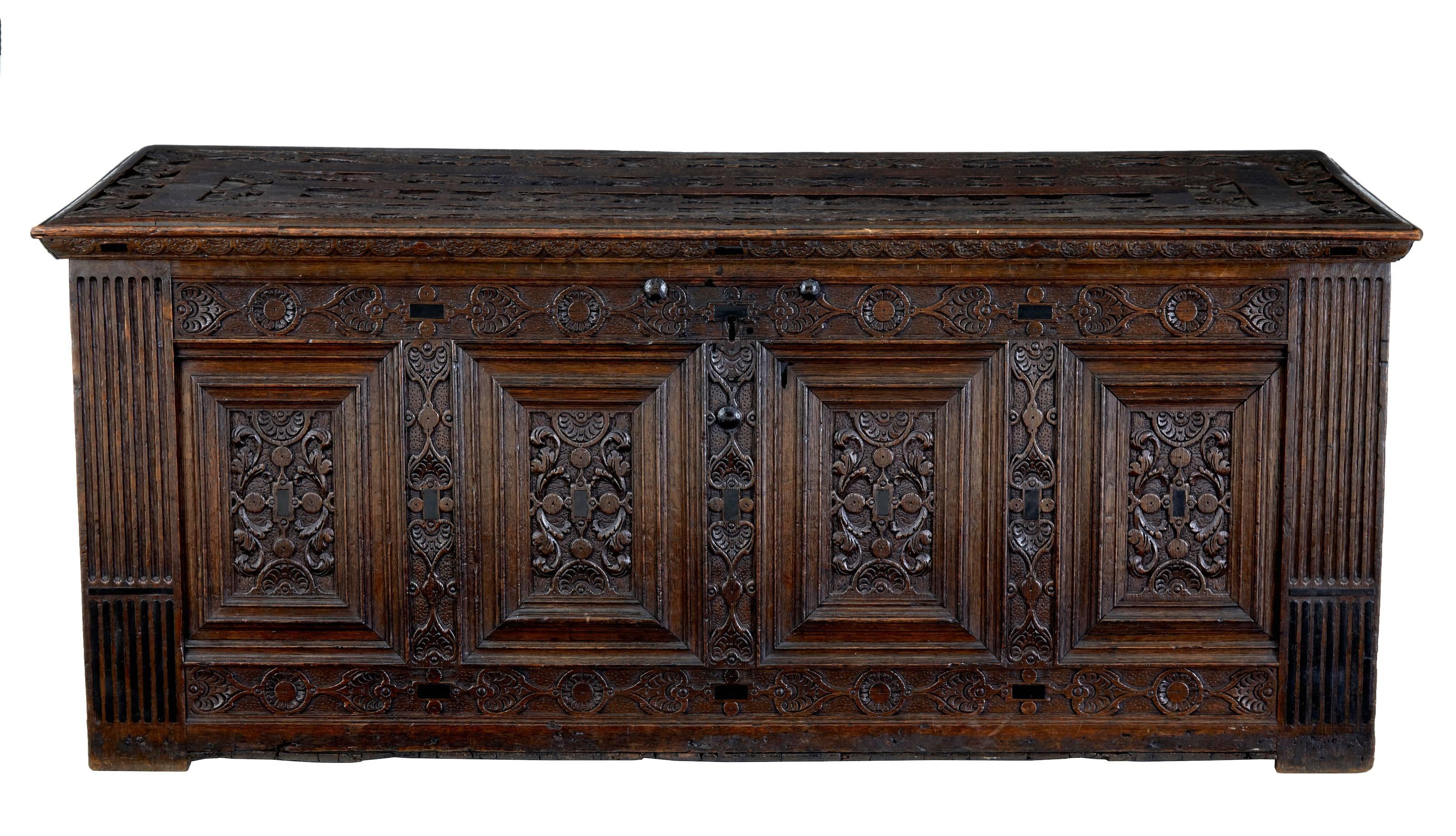 Fine quality Flemish oak coffer, circa 1680.

Beautifully carved featuring four panels to the front, surrounded by florals. Fluted corners and ebony detailing on all sides.
No lock present.
Shrinkage between the planks to the top.

Measures: