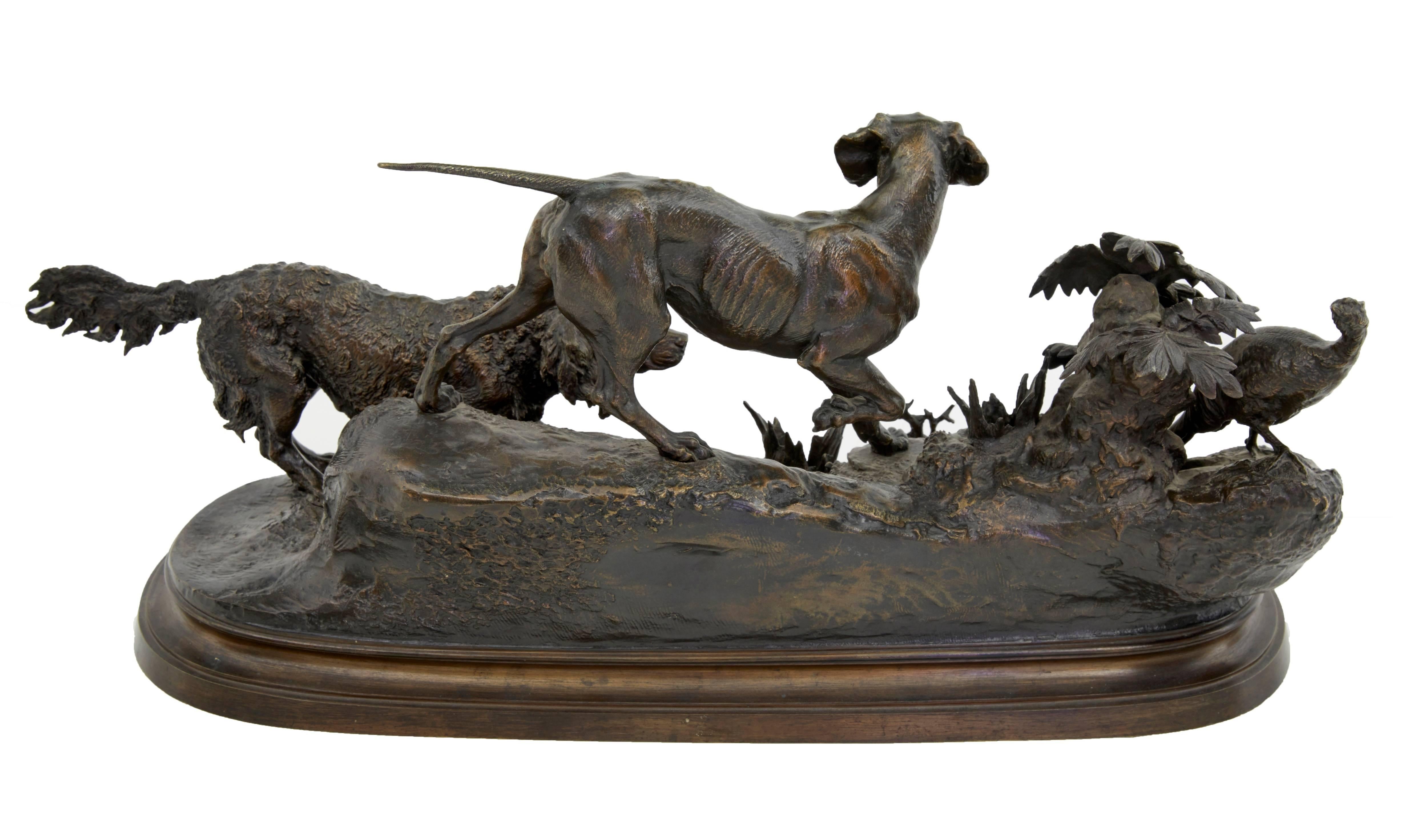 Bronze sculpture by Ferdinand Pautrot, circa 1860.

Ferdinand Pautrot born in Poitiers (1832-1874)
Well-known for his precision sculptures. This piece is a study of a pointer and a setter putting up a pheasant.

Good patination and