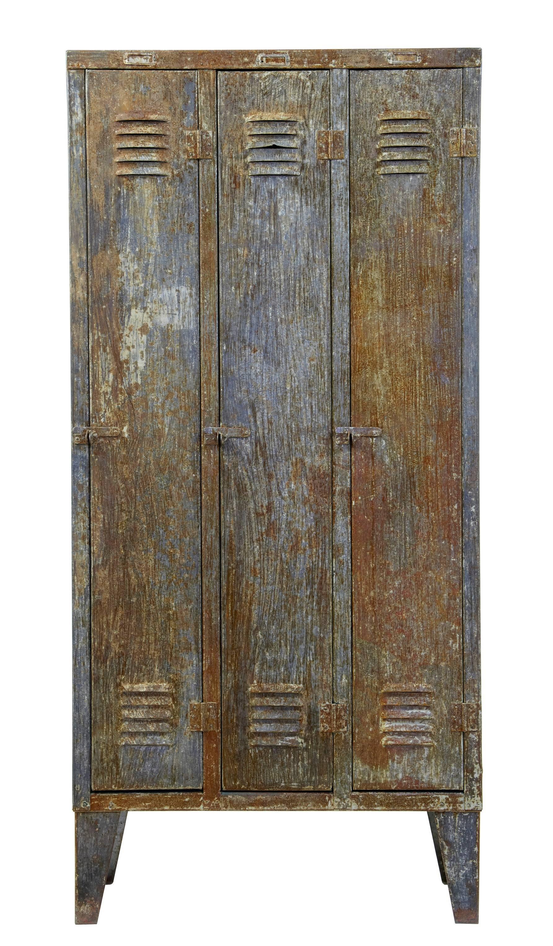 Three door 1960s locker room cabinet with distressed finish.
Measure: Height 78 3/4