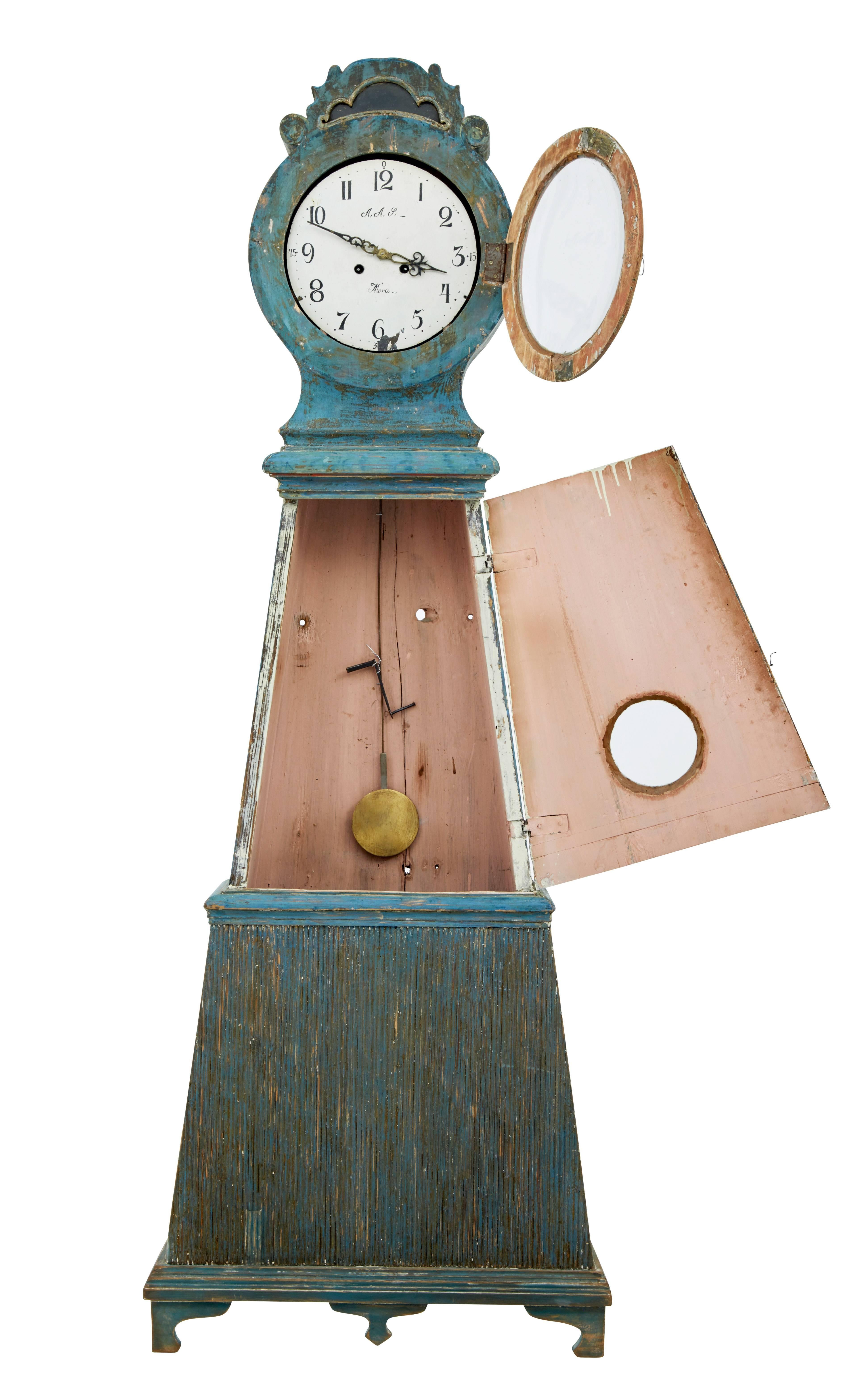 Stunning long case clock, circa 1850.
Presented to you with original scraped back paint.
Clock dial with makers initials from the Mora region.
Pyramid shaped with fluted detailing.
Complete with pendulum, weights and winding handle. We recommend