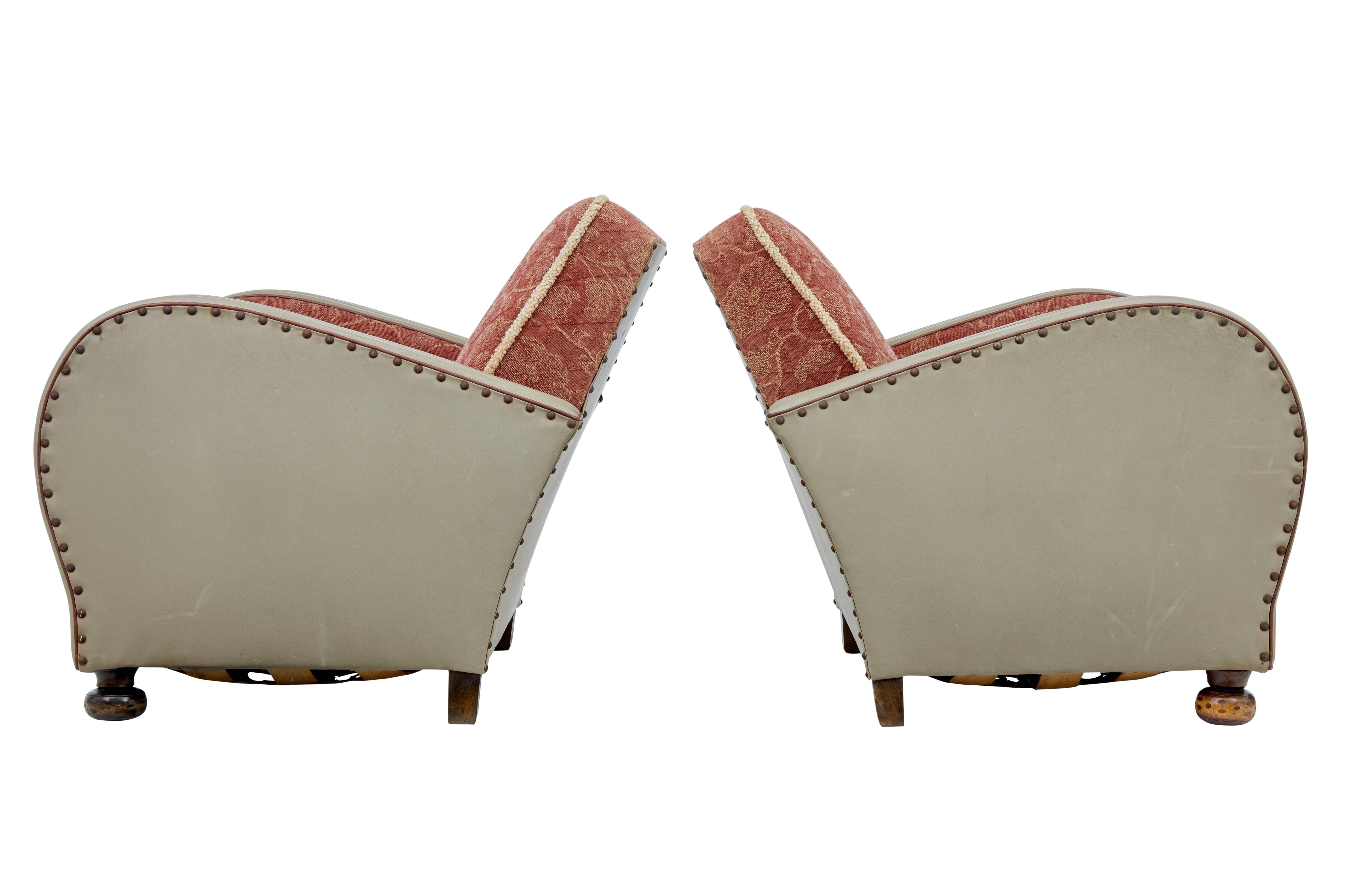 Good quality pair of period deco armchairs, circa 1920.
Typical Classic Art Deco flowing arms. Grey leather with red leather piping, floral material to back, seat and inner arms.
Standing on front bun feet.
Original leather is in good condition