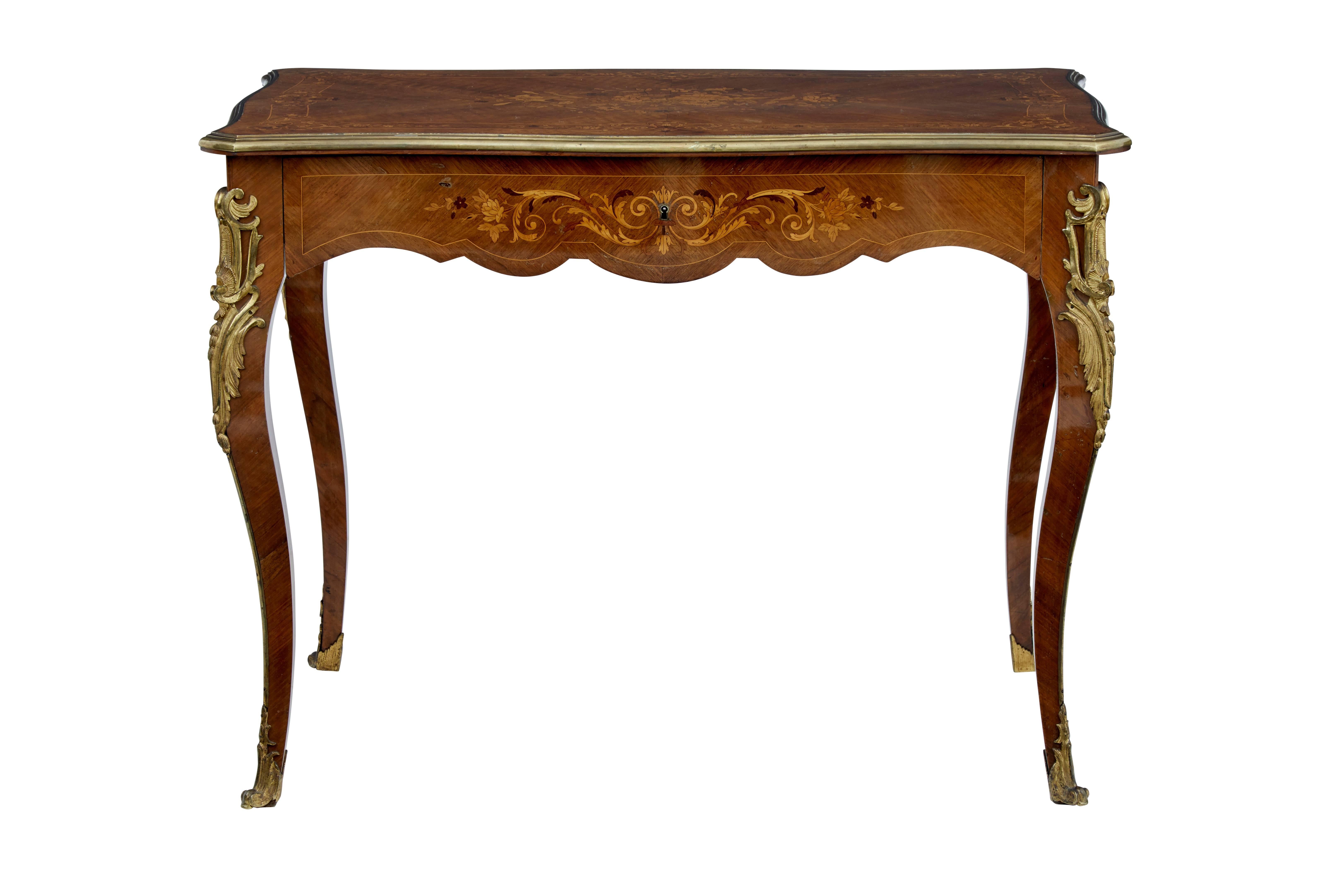 Fine quality French bureau plat of small proportions, circa 1870.
Beautifully inlaid to the top, drawer front, sides and reverse.
Freestanding in design, with ormolu mounts on the legs, feet and brass edging to the writing surface.
Single drawer