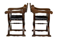 Pair of Early 20th Century Carved Oak X-Frame Armchairs
