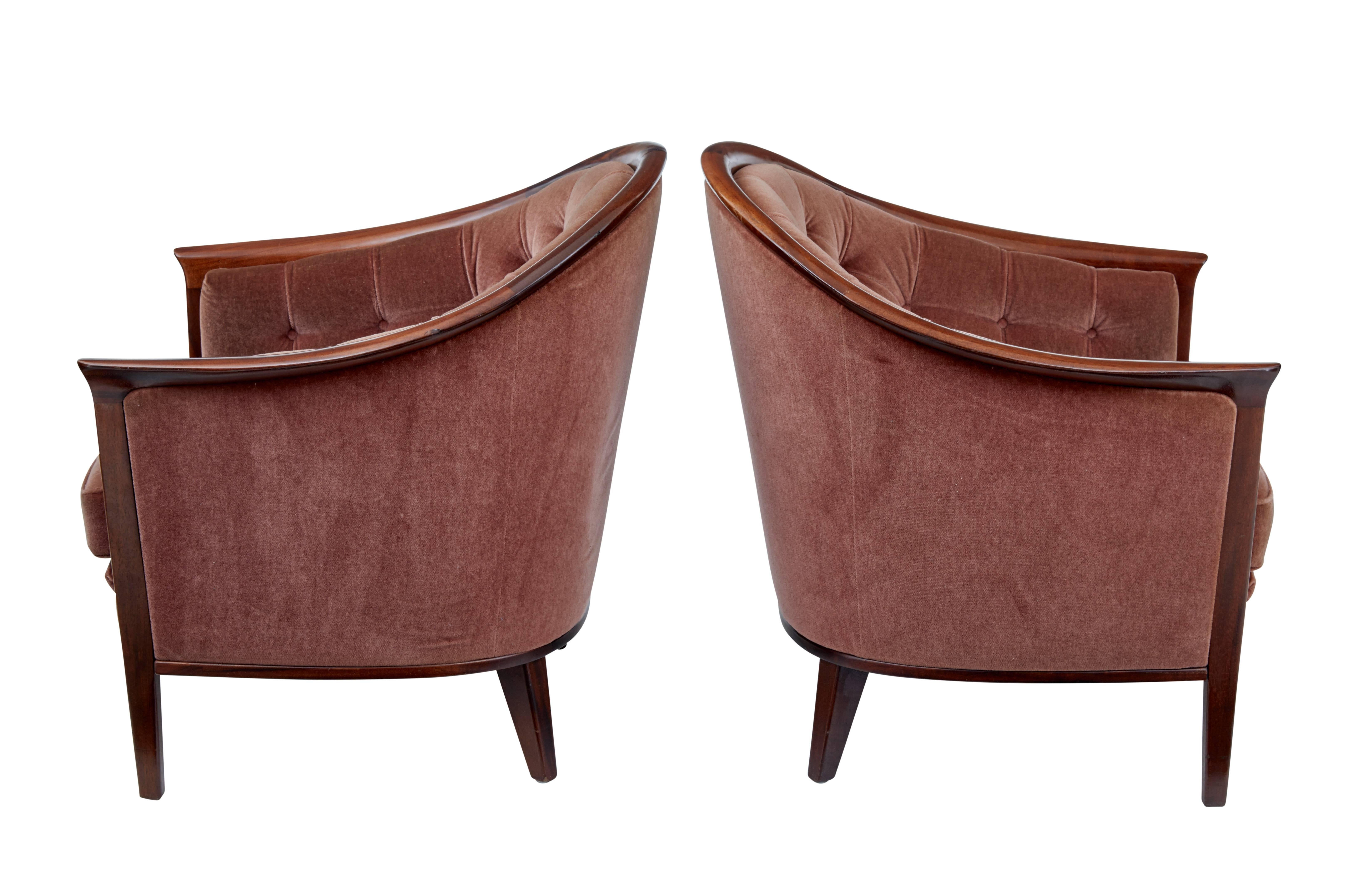 Good quality pair of Andersson horseshoe shaped armchairs, circa 1960.
Dark stained teak frames with faux velvet upholstery.
Some marking to woodwork on the backs of the chairs (photographed)
Some minor staining to fabric.

Measures: Height 32