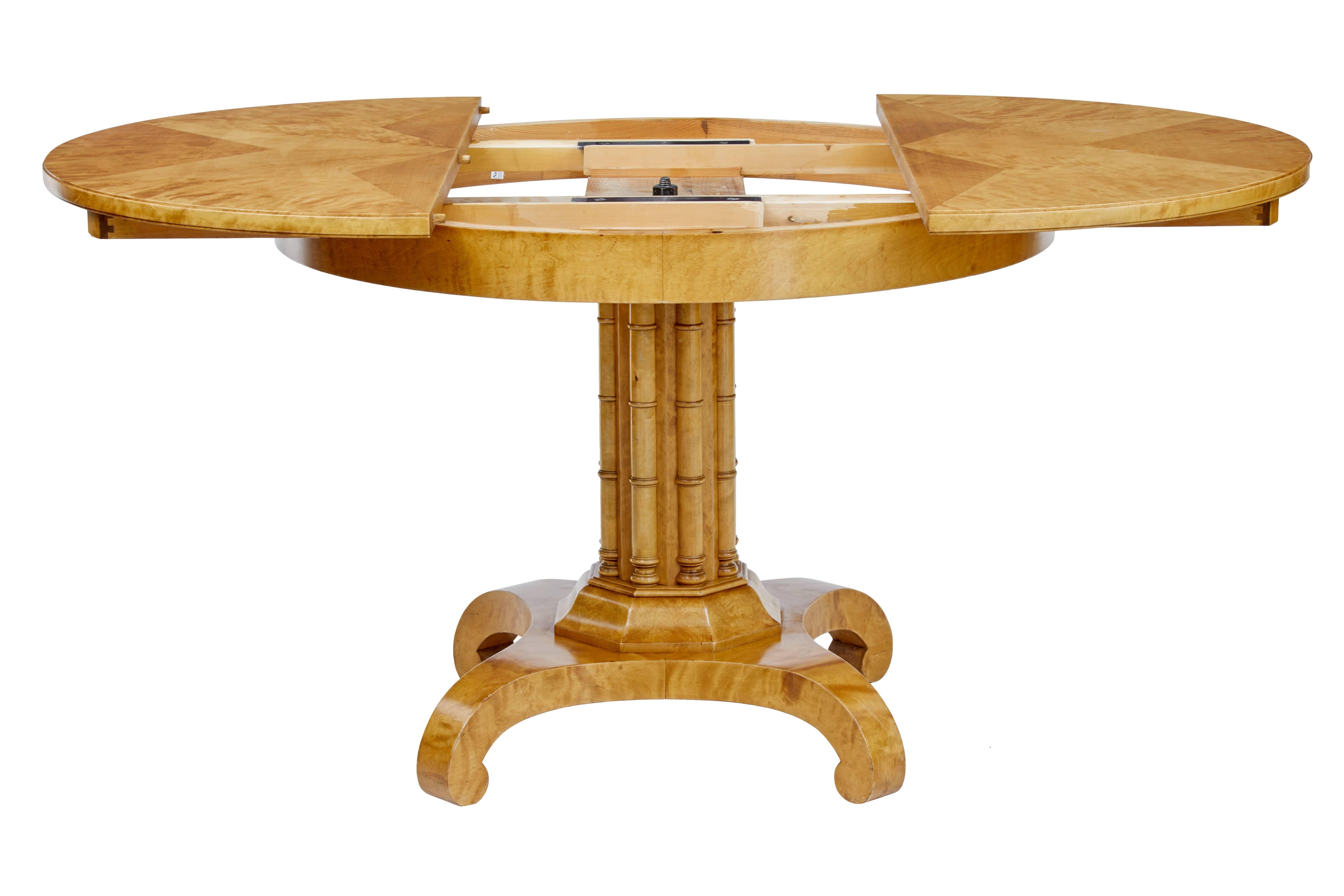 Fine quality birch table, circa 1920.
Circular top with inlaid star design on the top.
Octagonal stem base with applied turned faux bamboo columns.
Standing on a quadriform base and scrolled feet.

We are selling this as a centre table, but the