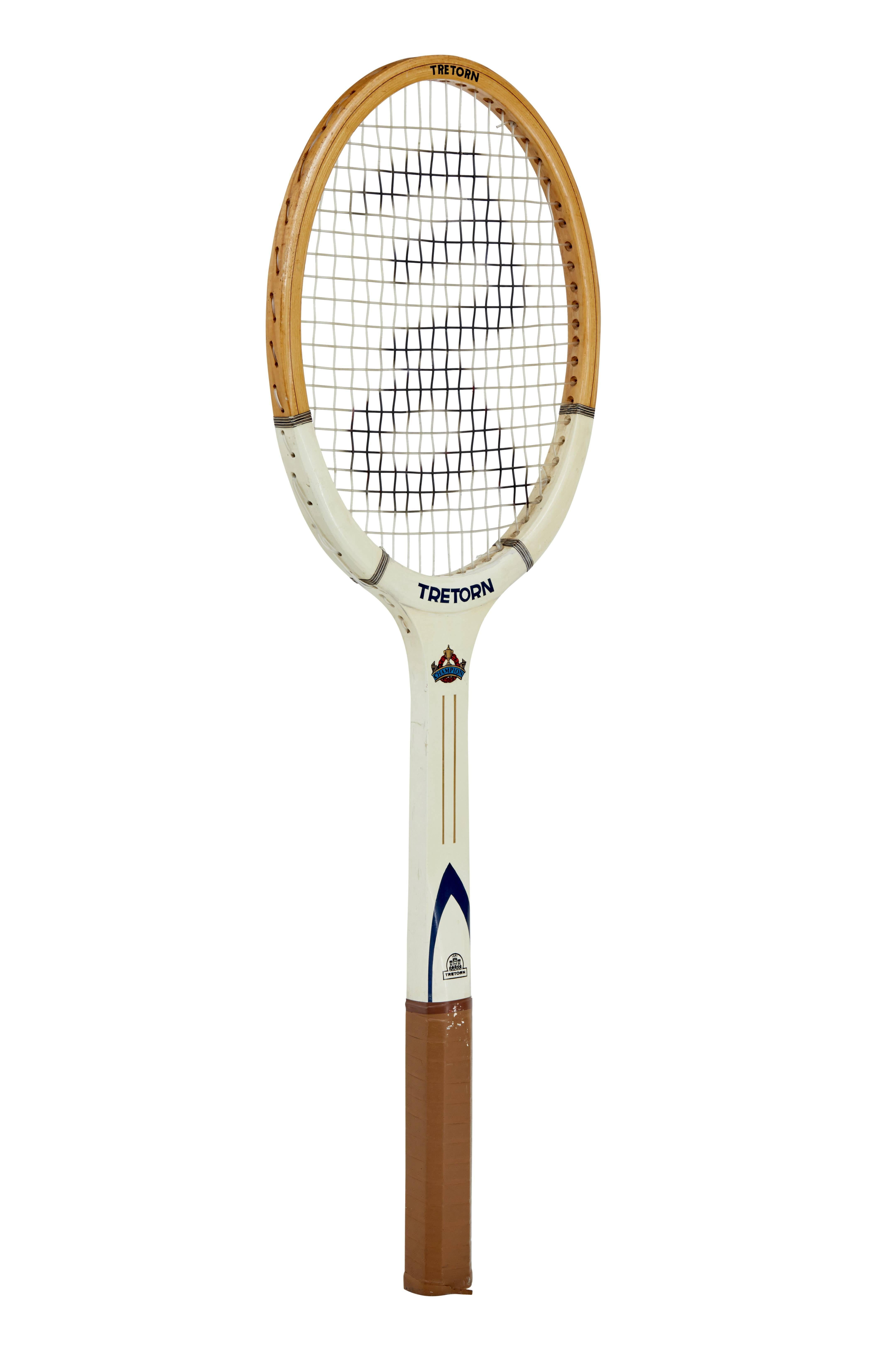 Novelty wooden frame tennis racket that must have been made for a special commission or promotional display.
Tretorn 'champion' wooden frame model.
Measures: Length 54