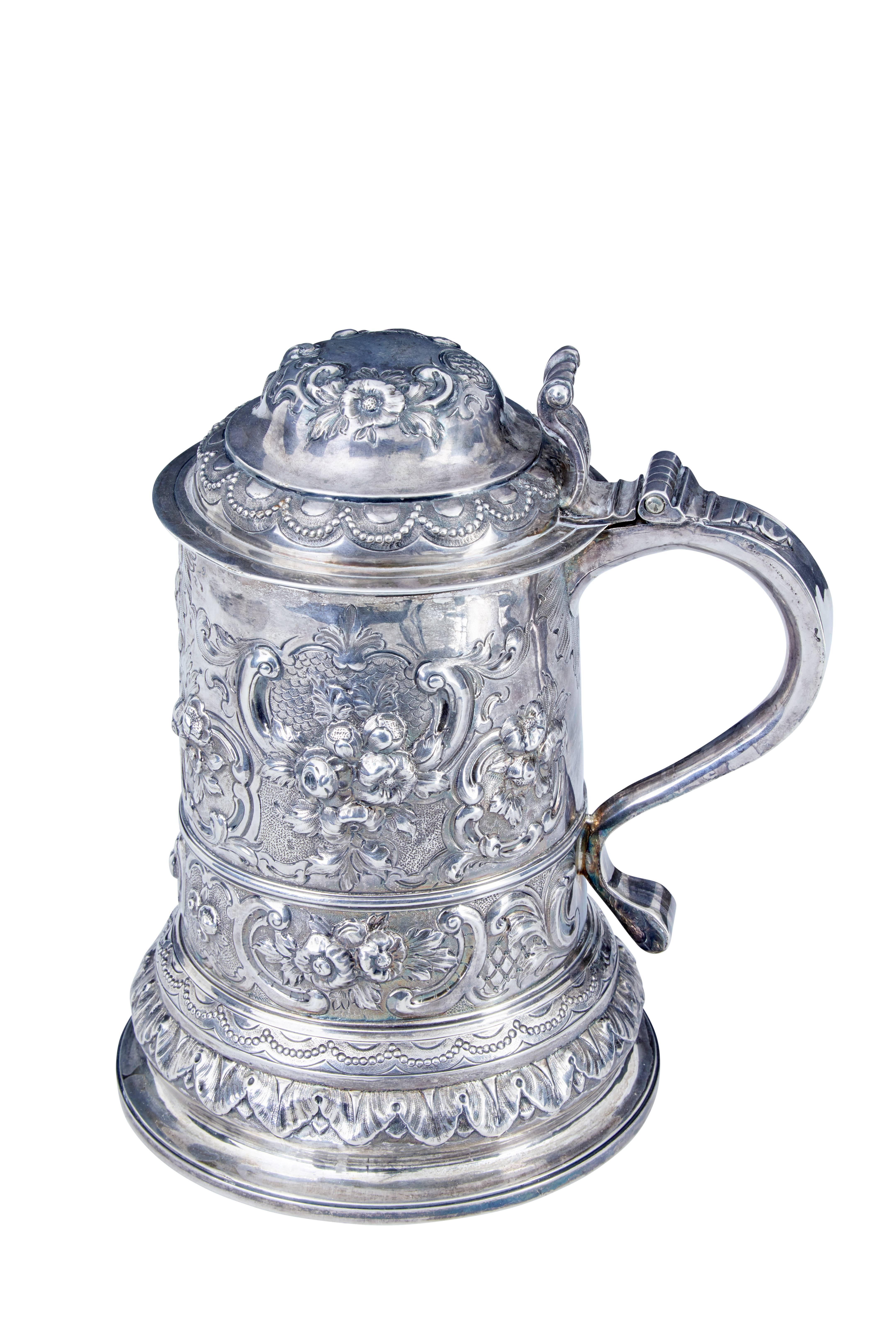 John Penfold (aka Penford) makers mark Rococo silver lidded tankard.
Here we have a beautiful silver lidded tankard in the Rococo style. The interior is gilded and 
overall condition is good.
The tankard bears exterior and interior makers marks