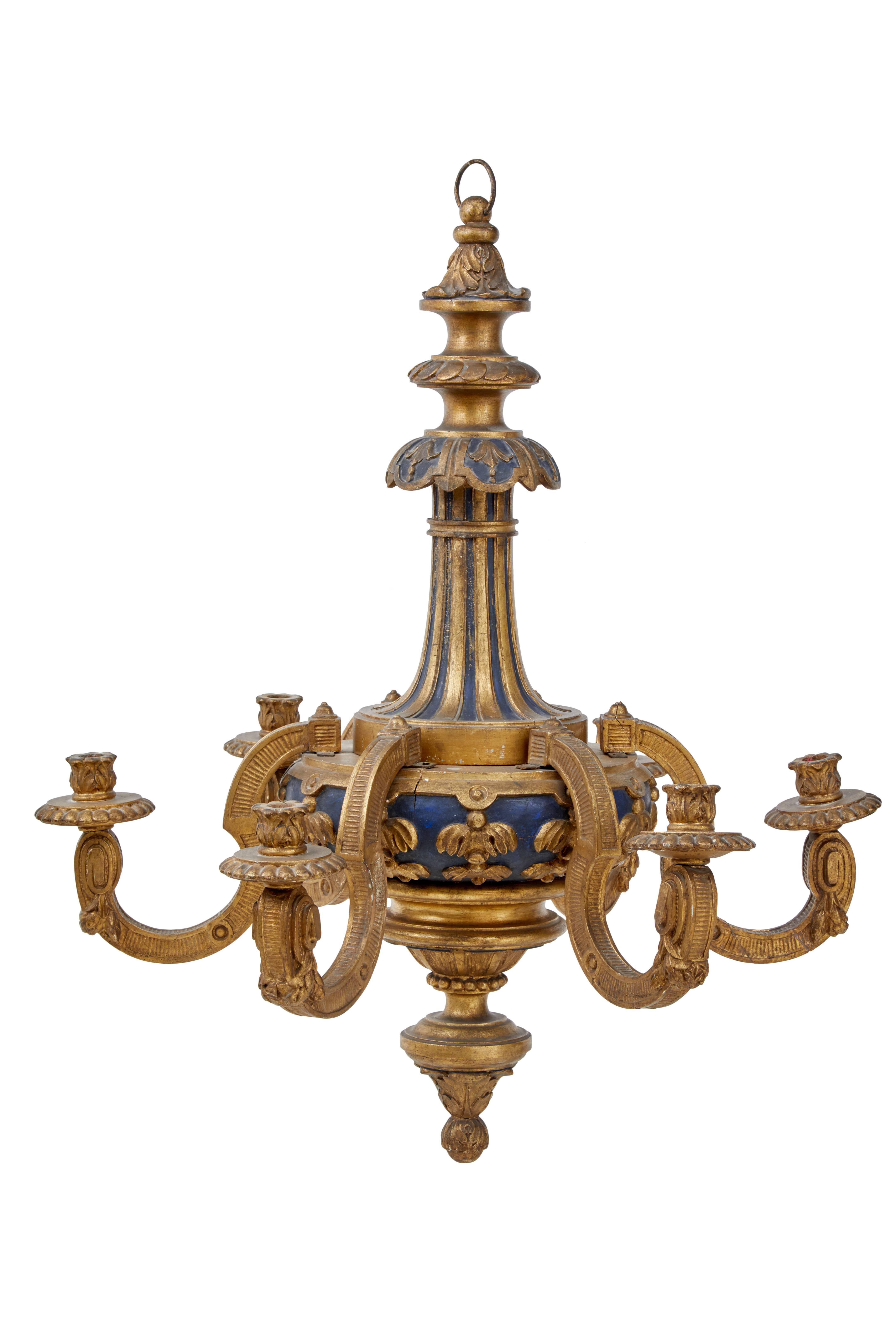 Stunning pair of French chandeliers circa 1900.
Six arms on each chandelier.
Beautifully carved and gilt against a back drop of dark blue.
These had been previously wired for electricity but all wiring has been removed.
Due to the fragile nature