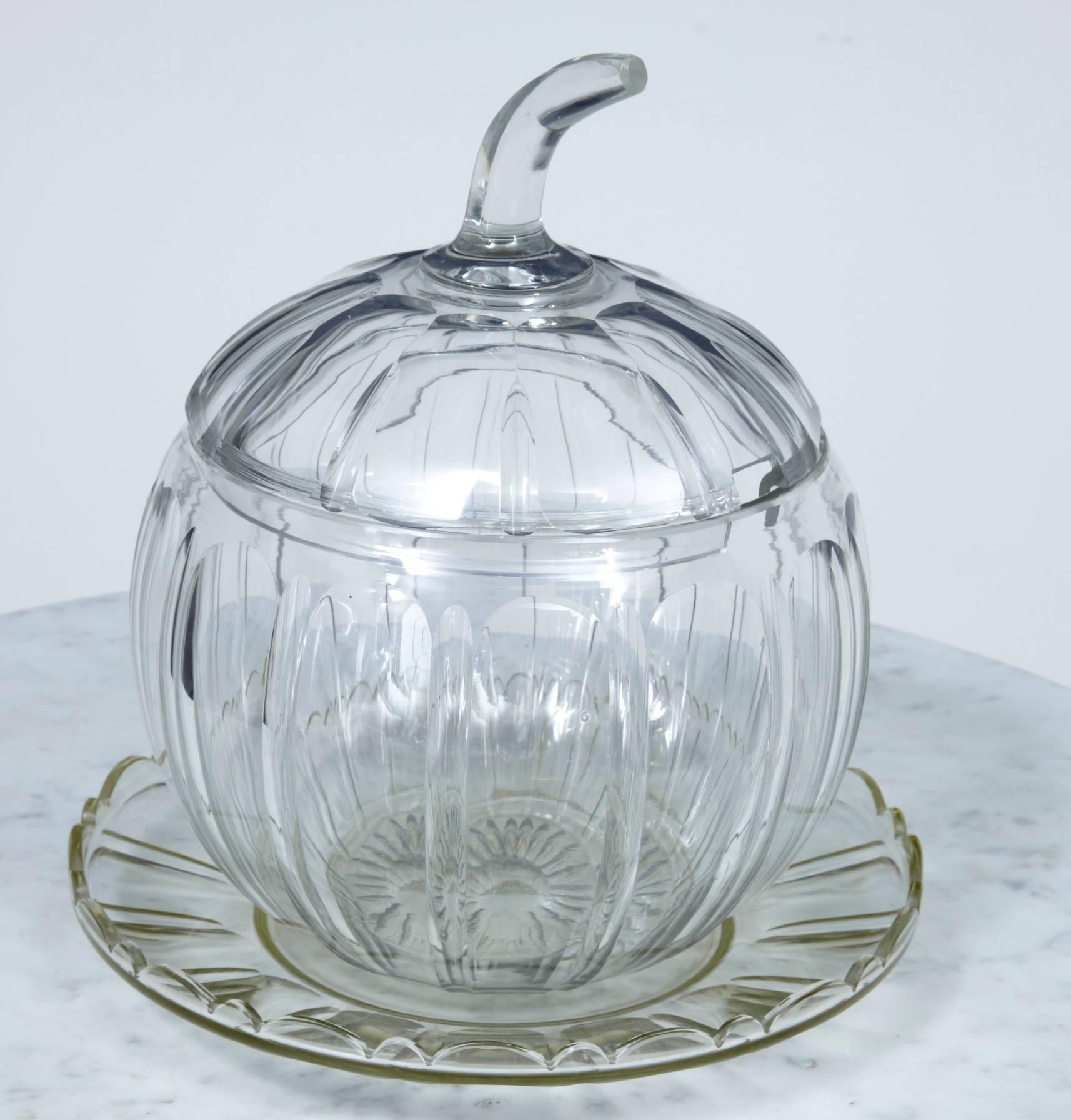 A finely cut class pumpkin, circa 1920, complete with original matching glass saucer, silver gilt ladle.
