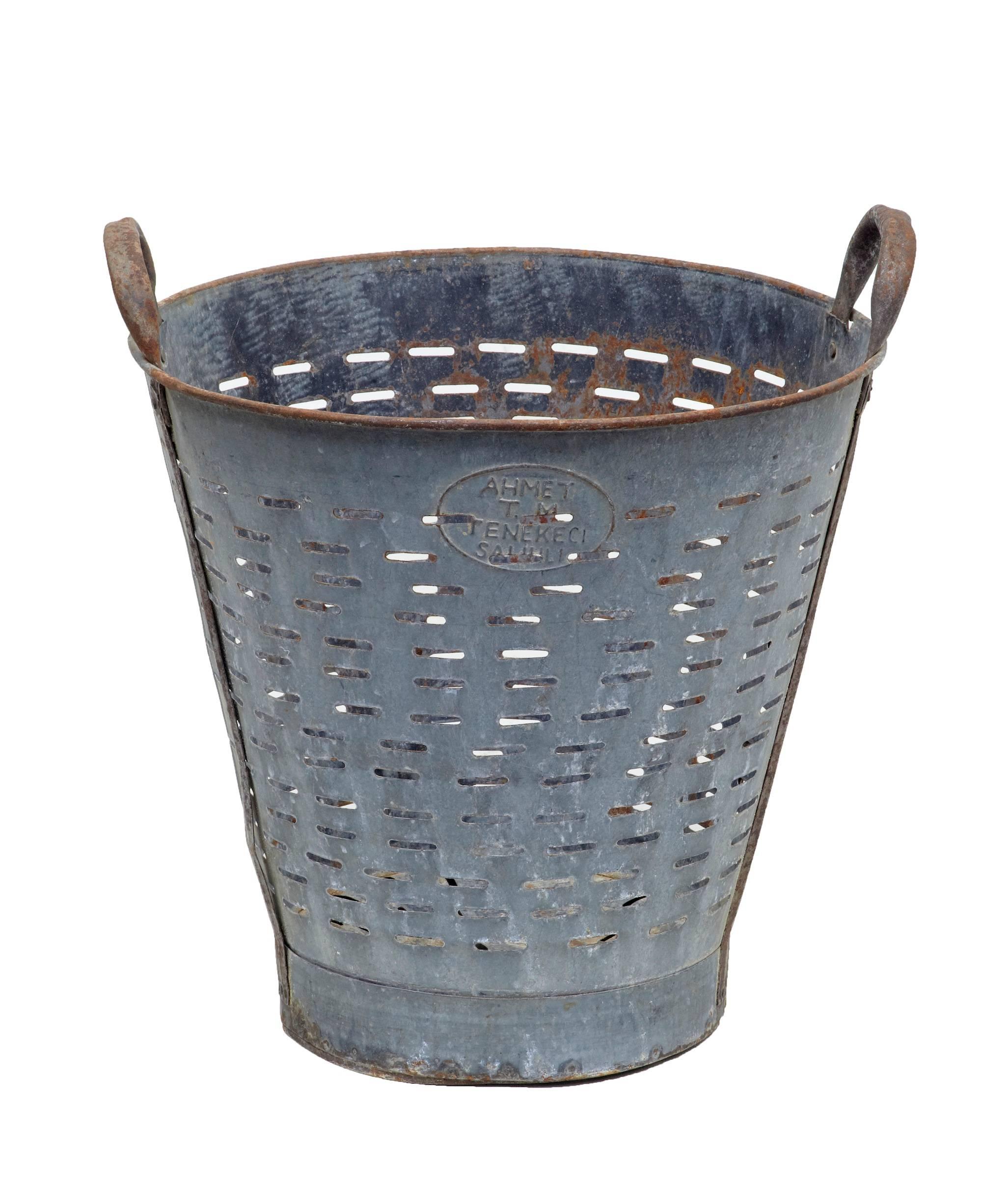 Metal slotted basket, used for fishing, circa 1900. Perfect for use now as a unique waste paper basket. Mild rusting.
Measures:
Height: 18 1/3