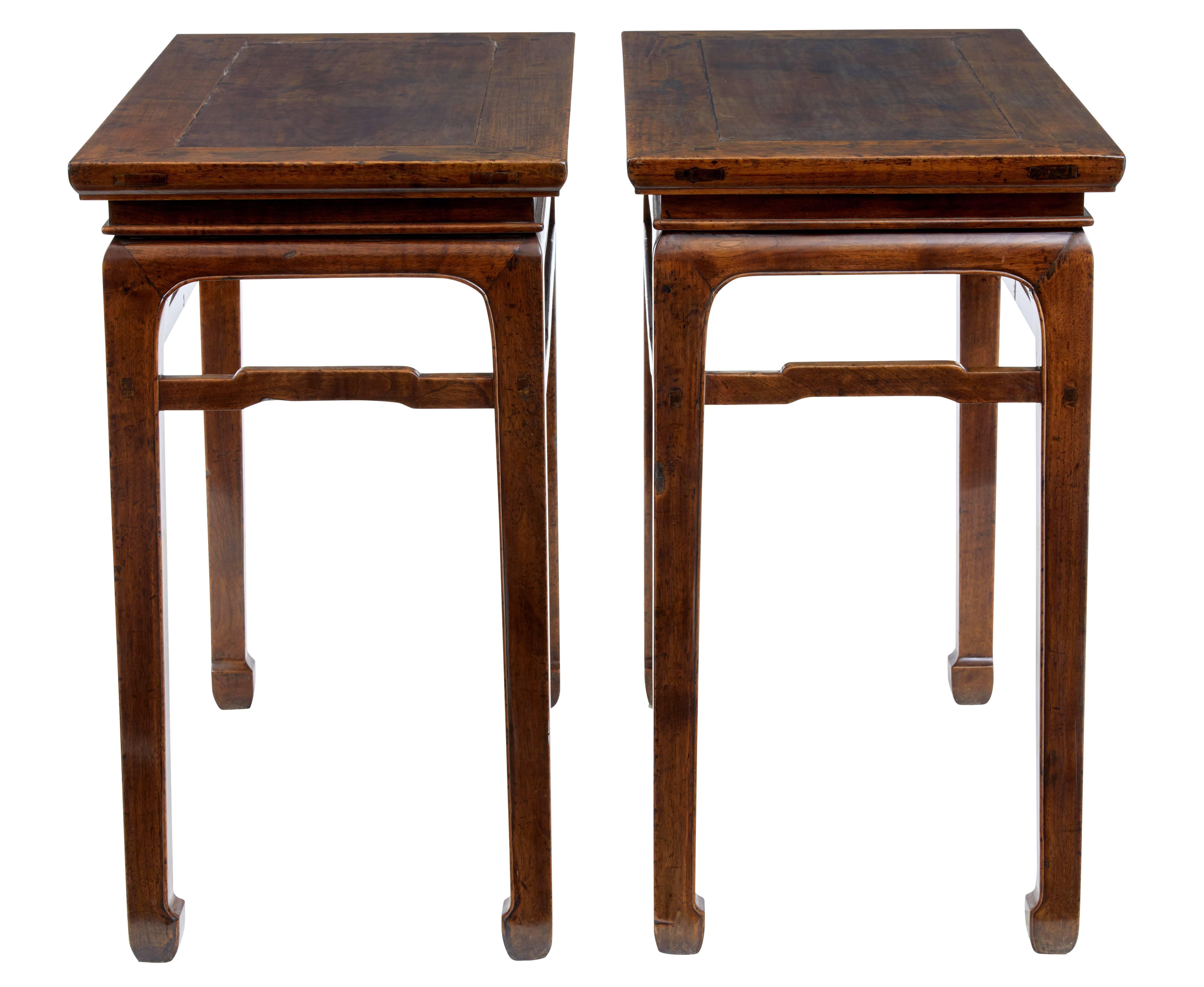 Pair of good quality Chinese hardwood console tables, circa 1880.

Unusual to find a pair of tables of this kind, which makes these tables rare.

High lacquer finish with original patina.

Expected staining and ring marks.